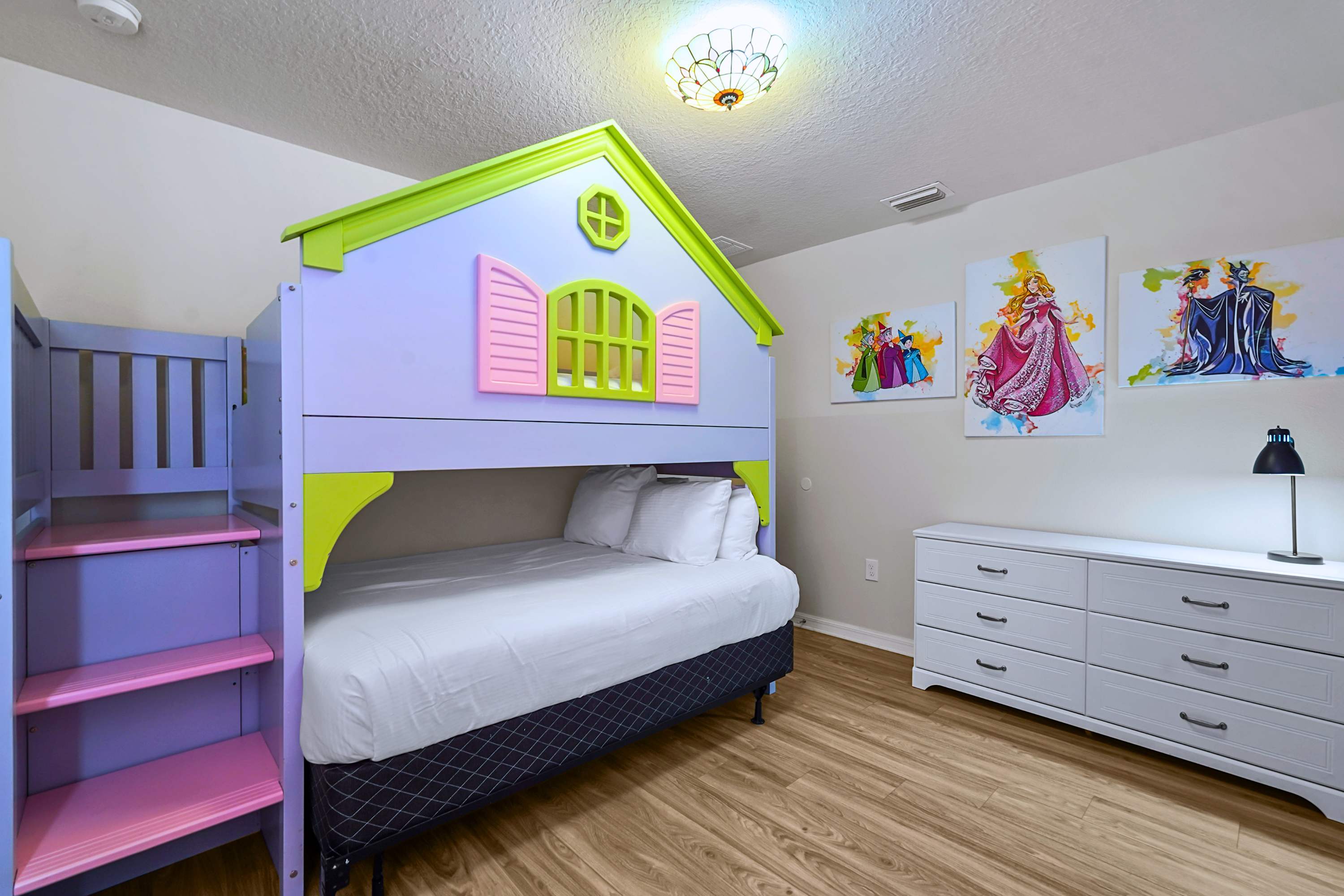 Epic custom playhouse bunk beds with queen and twin beds make bedtime the highlight of the vacation!