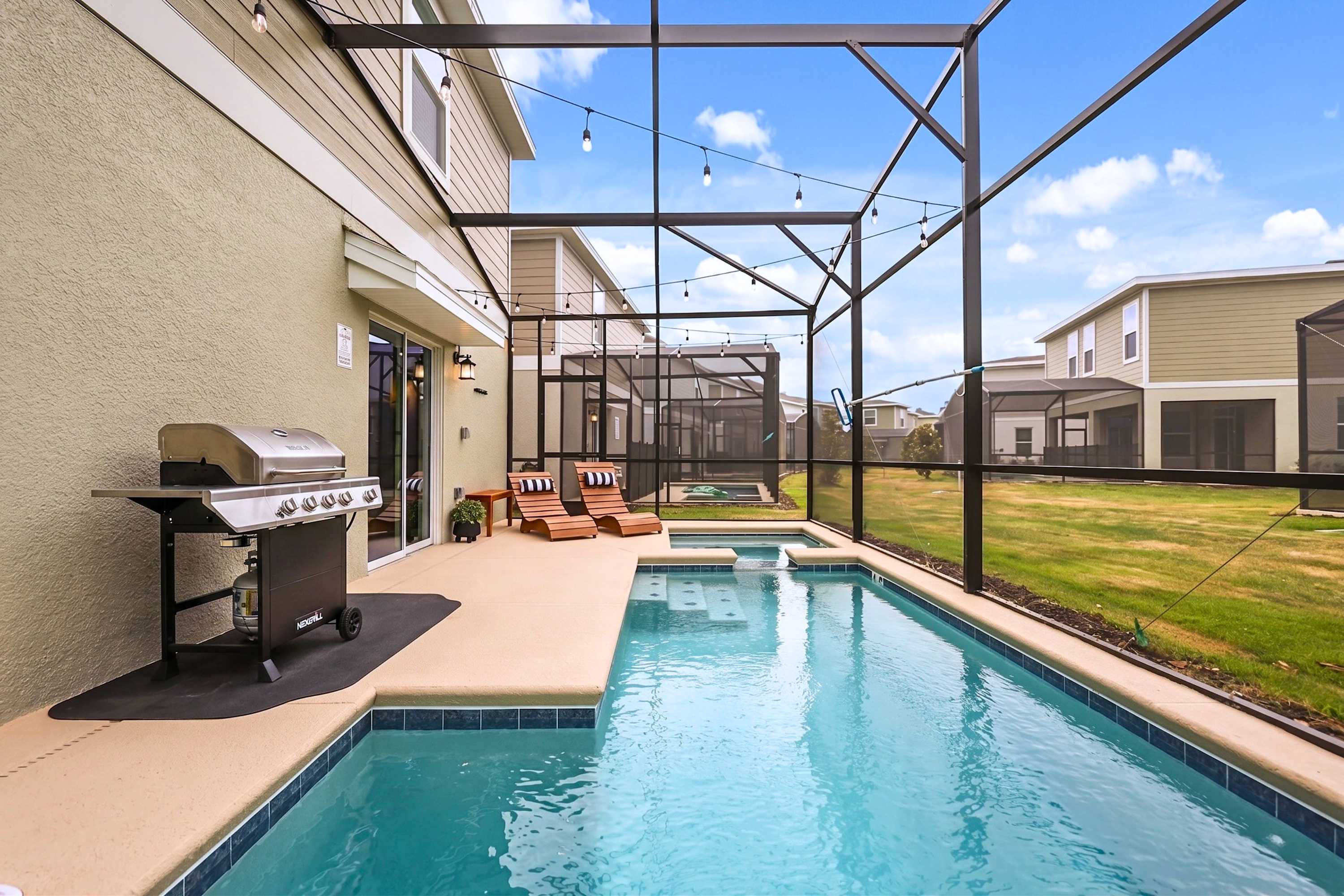 Spacious pool with hot tub layout, ideal for relaxing resort style stays