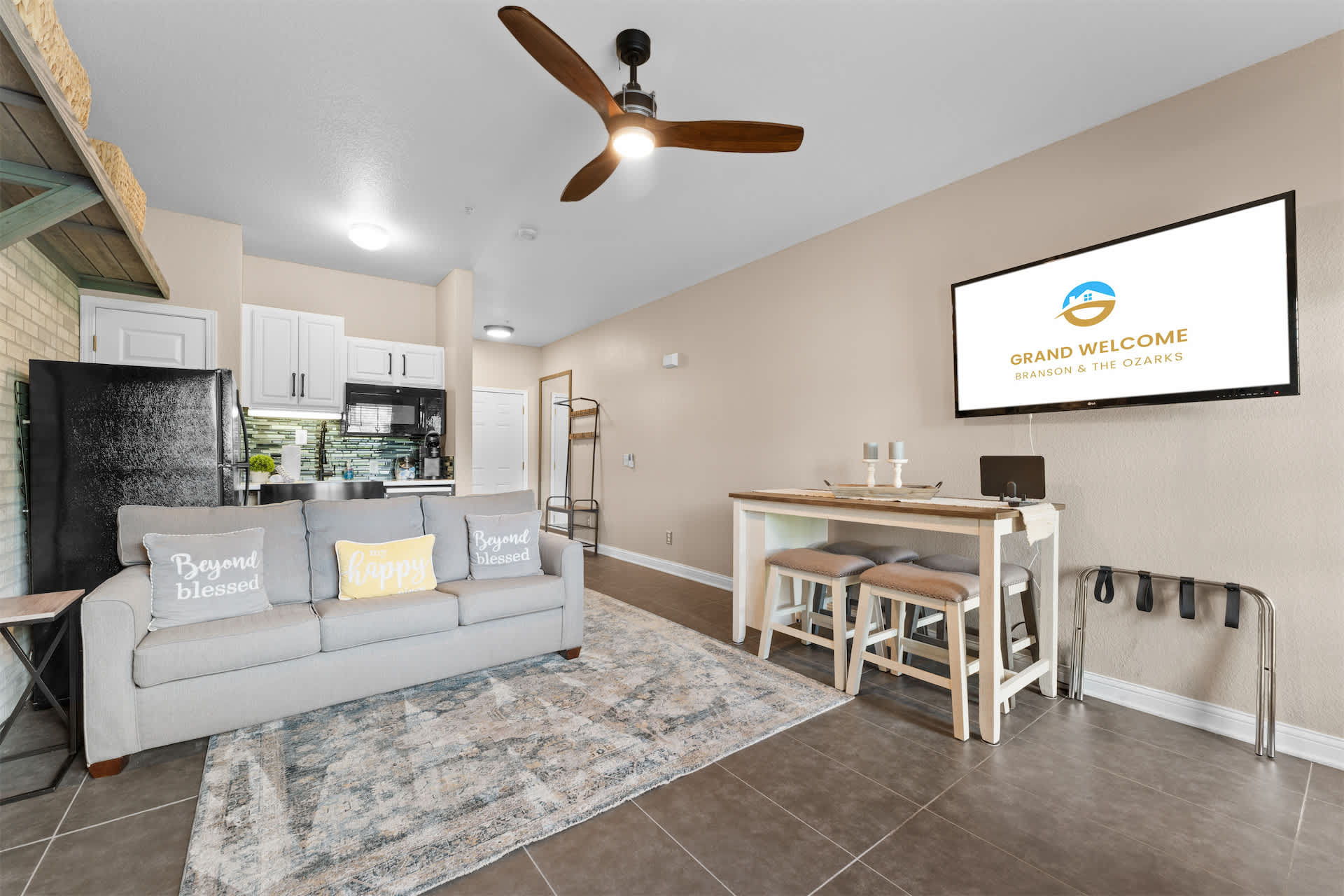 Stream your favorites on the smart TV from the queen Murphy bed or sofa sleeper ​