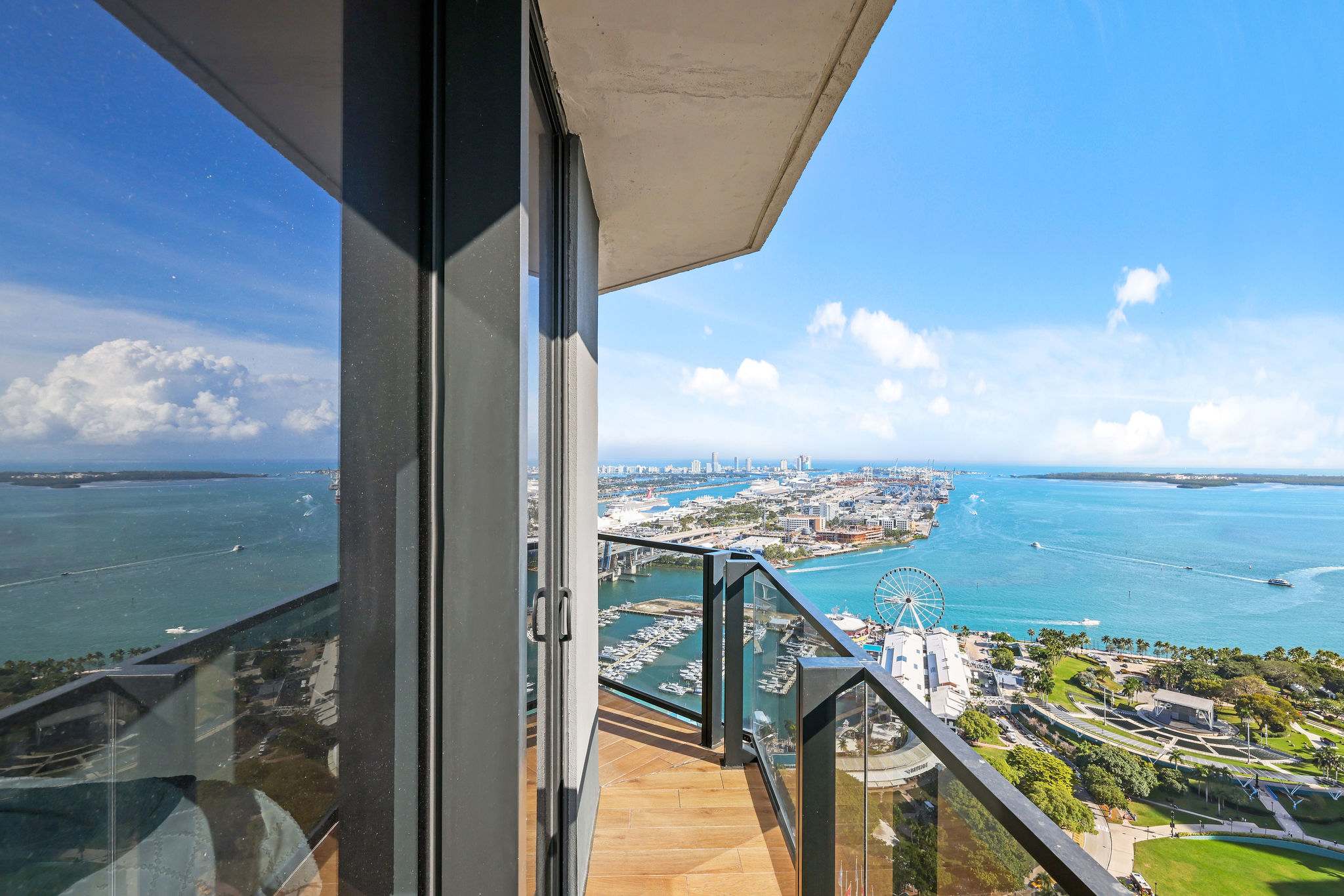Enjoy breathtaking ocean and city views from your private balcony, perfect for relaxing and taking in the sights.