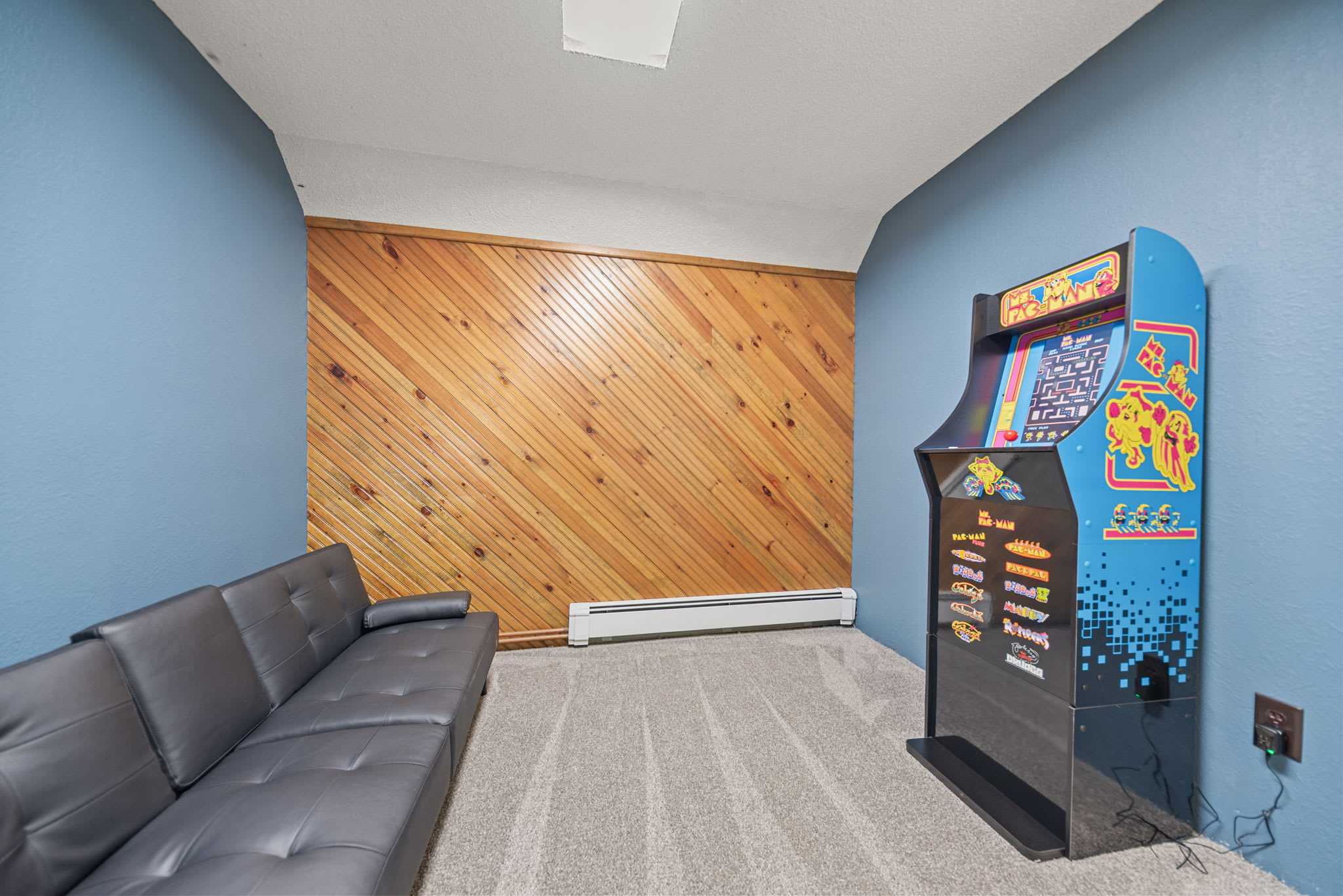 Game room with arcade fun keeps everyone entertained indoors.