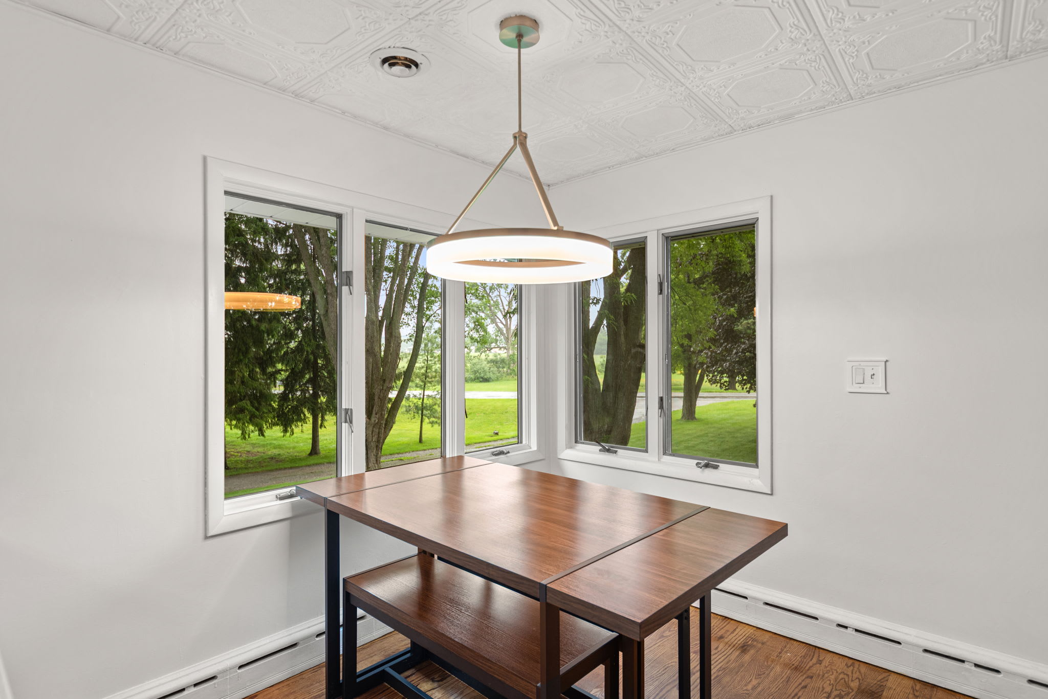 Breakfast nook with park views for relaxed morning meals.