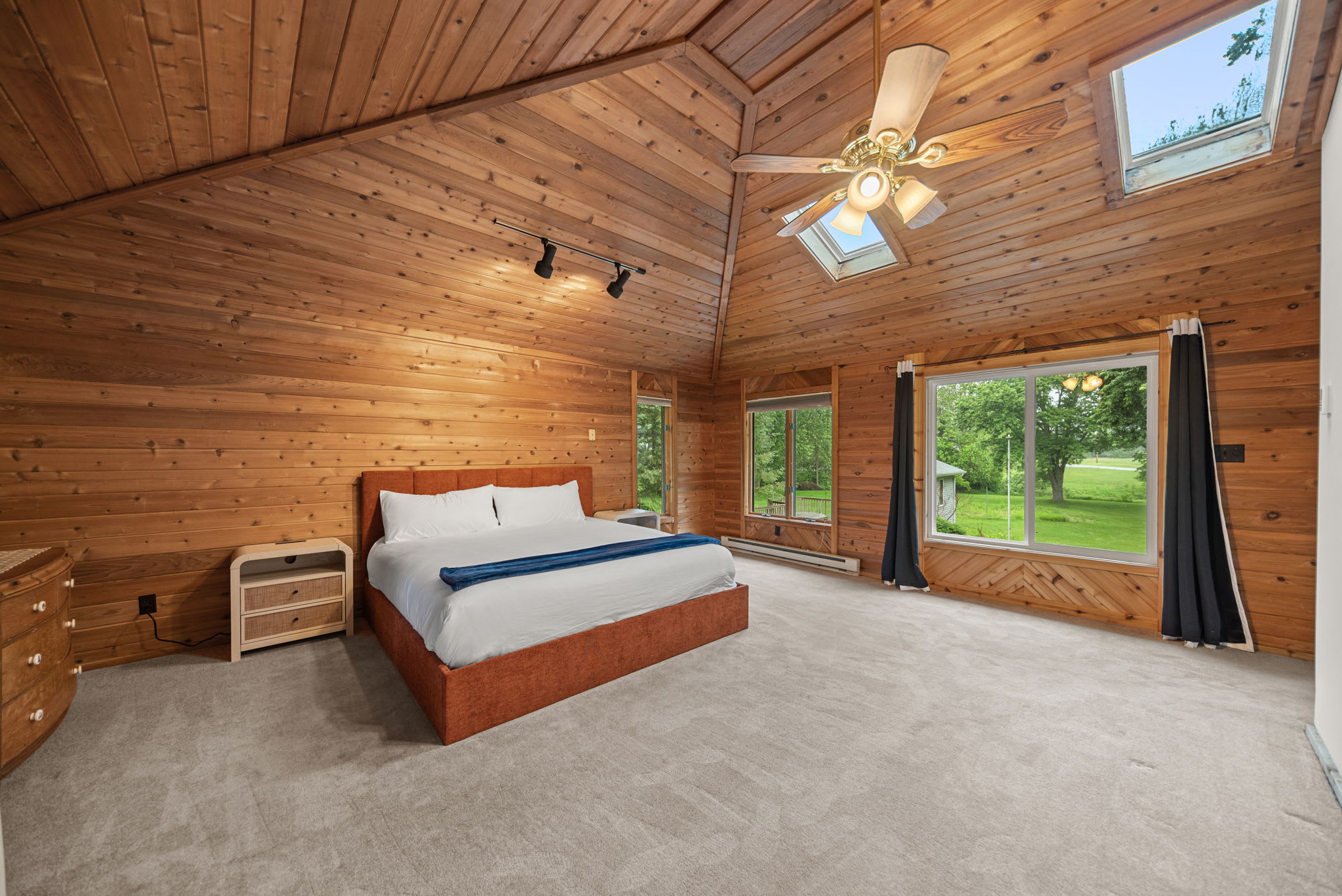 Primary Suite is on the upper level with a king-sized bed.