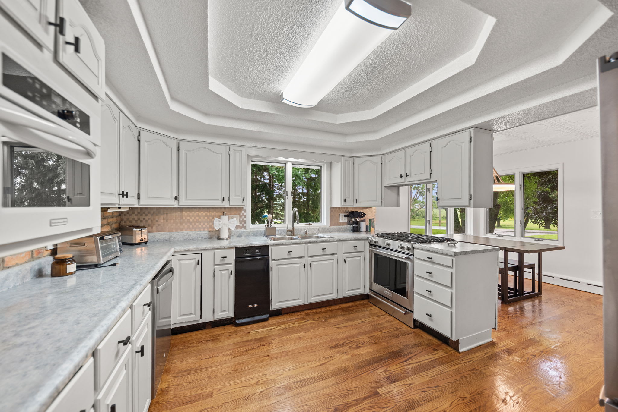 Main level kitchen with generous prep space for group meals.