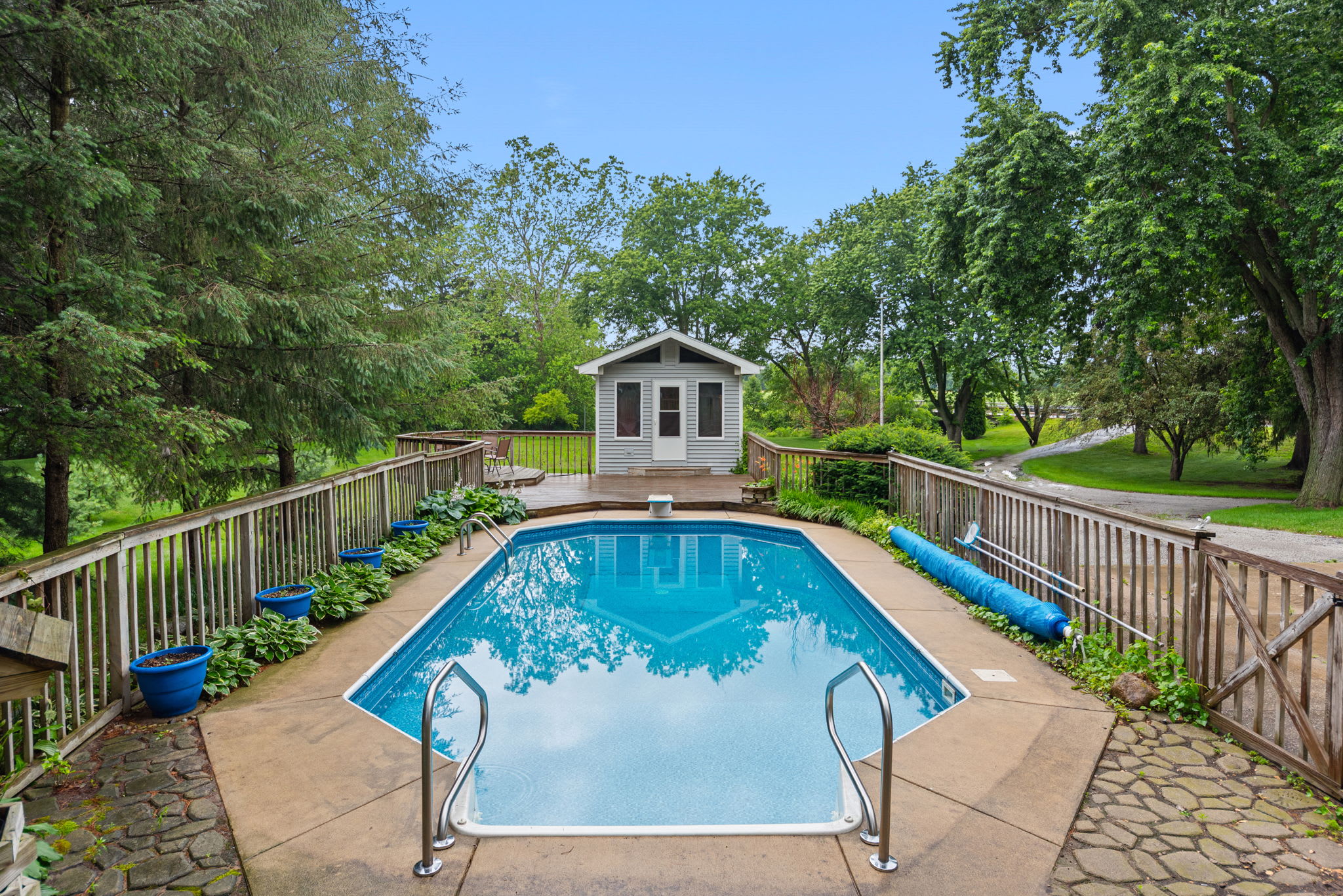 Private pool deck offers room to lounge, swim, and unwind.