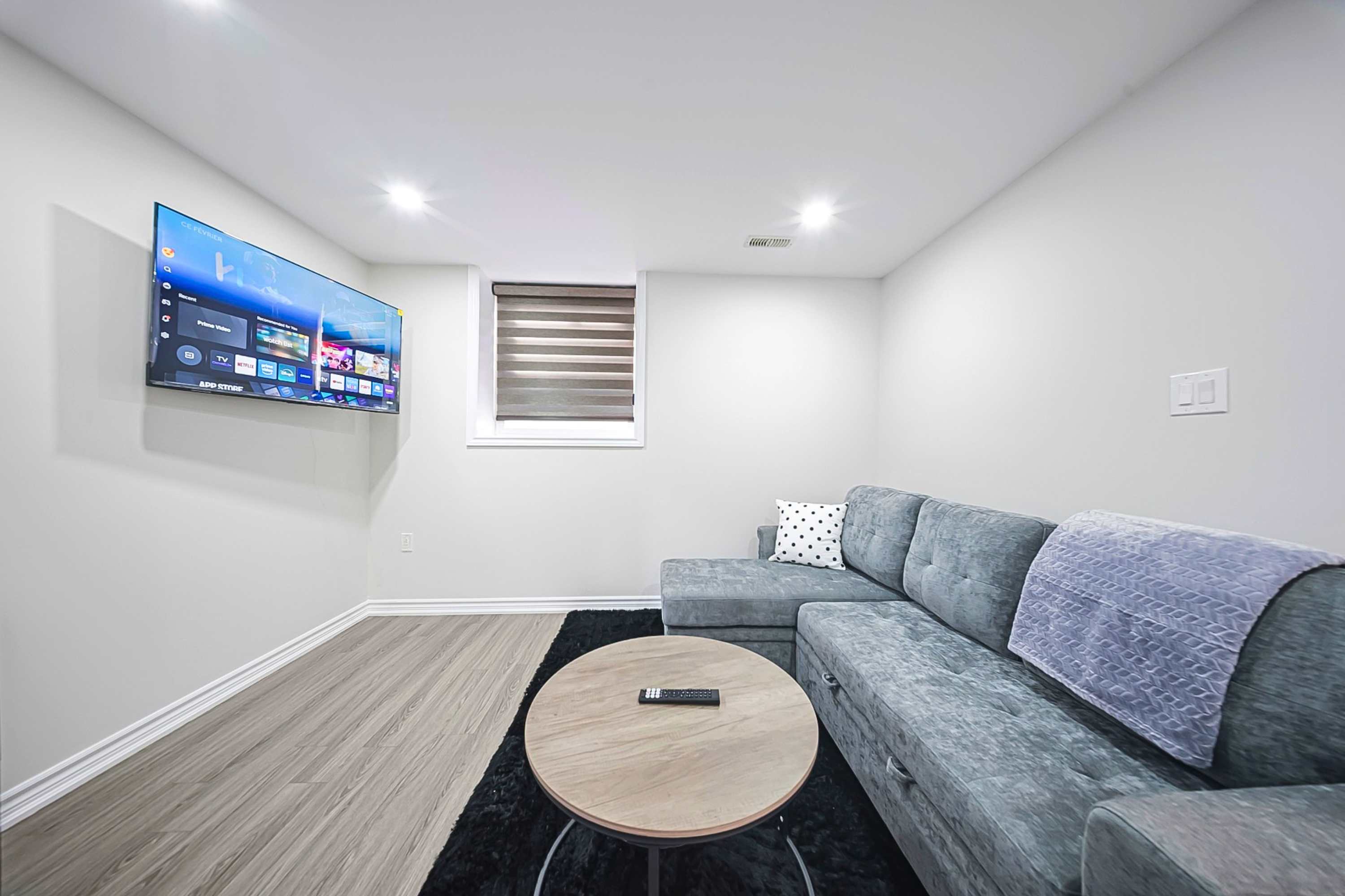 Bright Basement Suite w Parking near McLennan Park