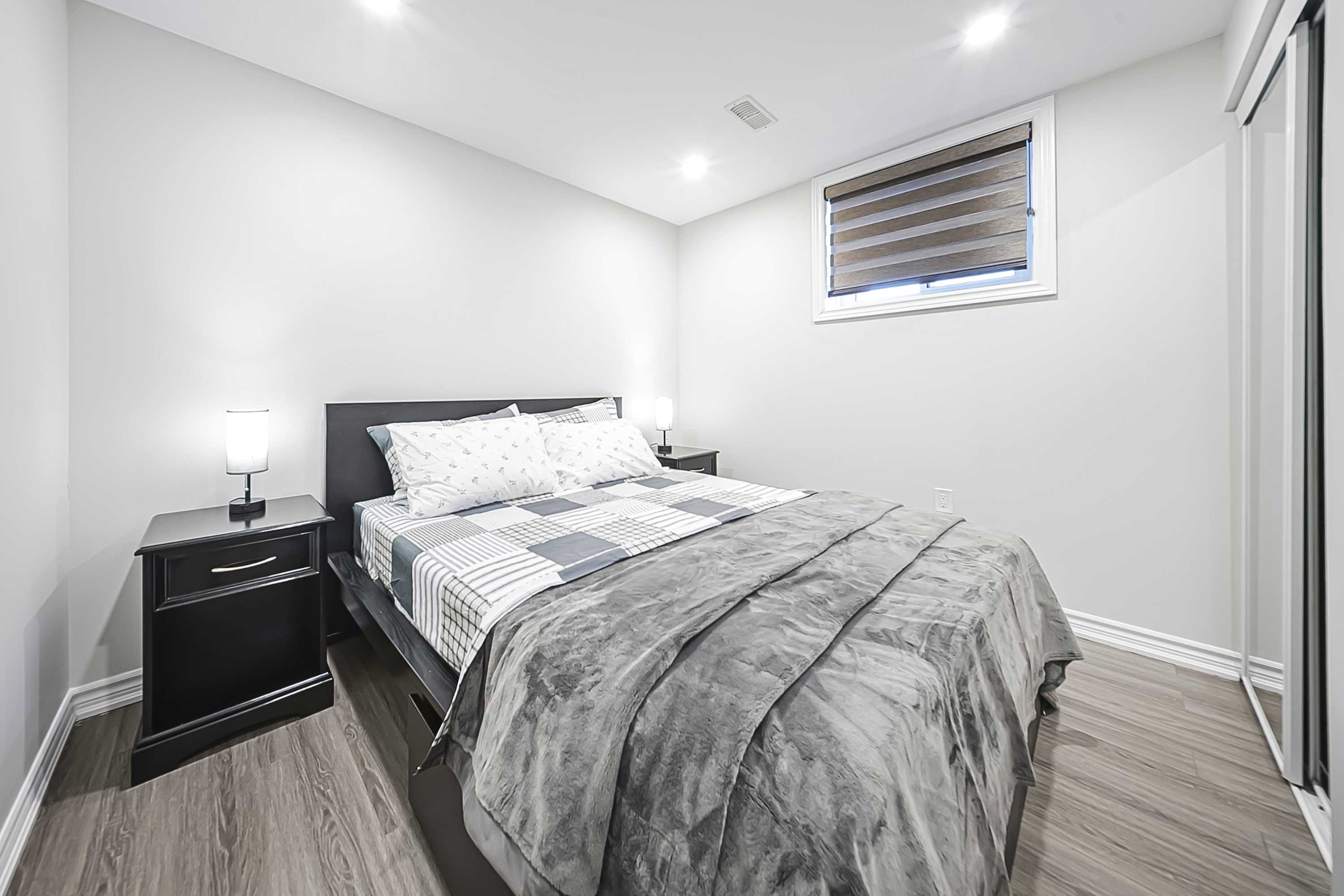 Bedroom with queen bed and fresh linens