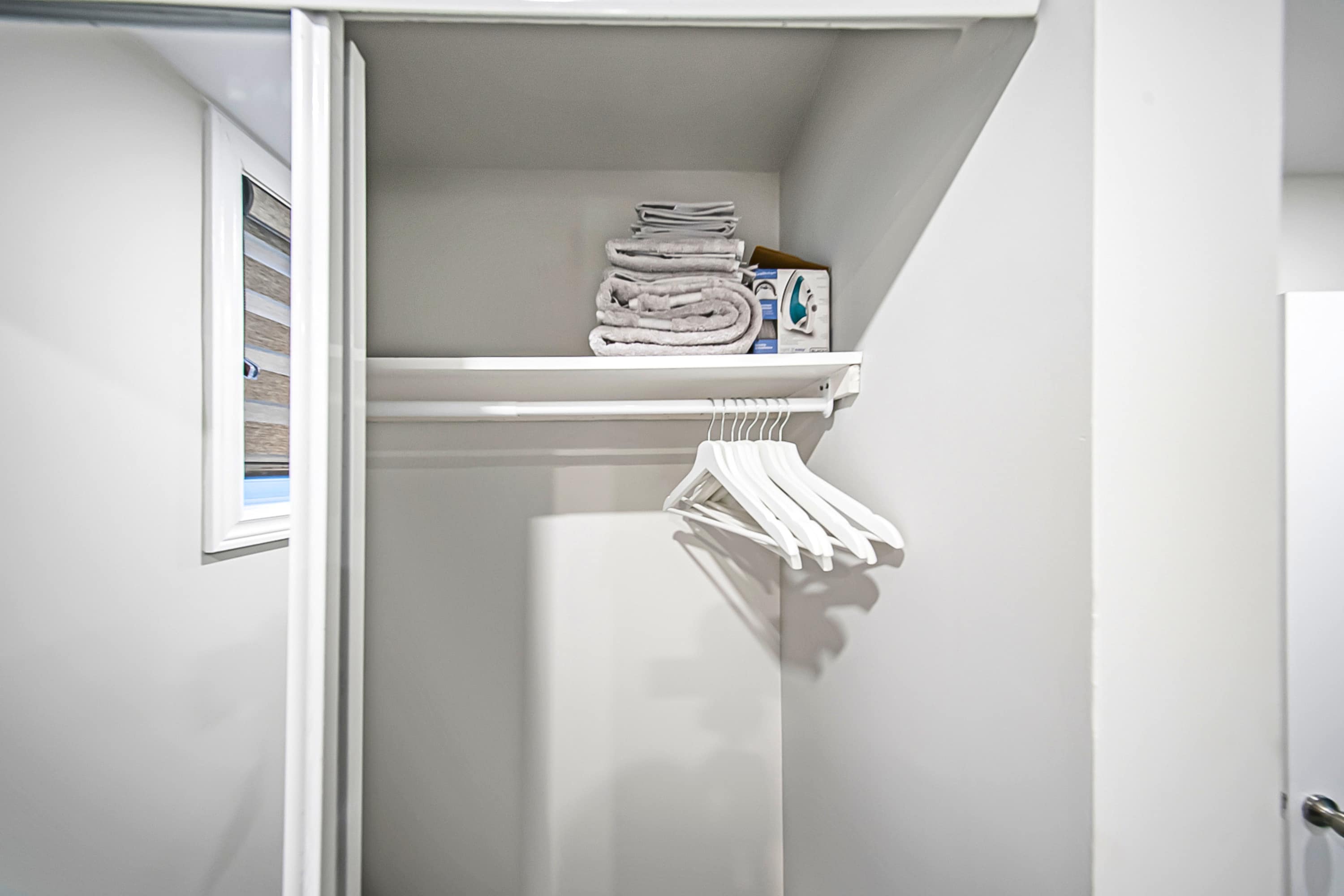 Closet stocked with extra towels