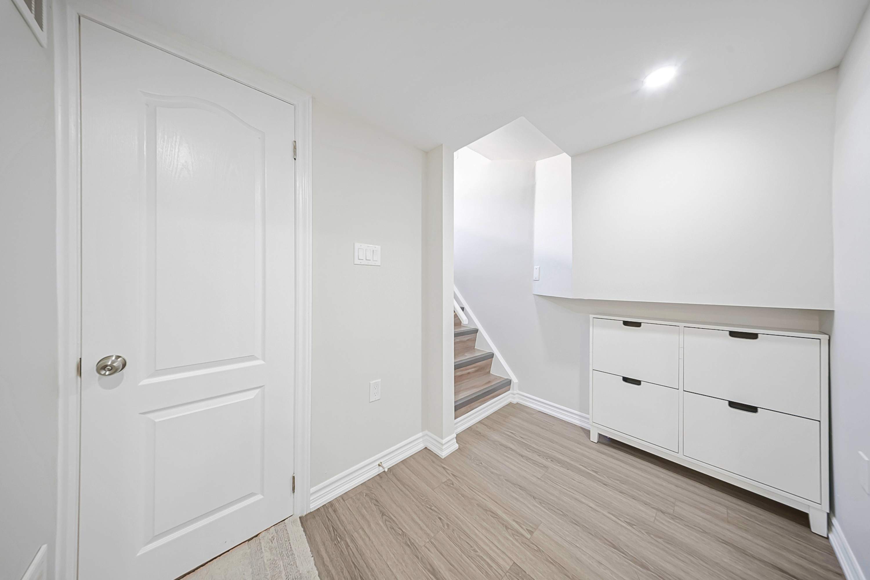 Entranceway with a cabinet for additional storage