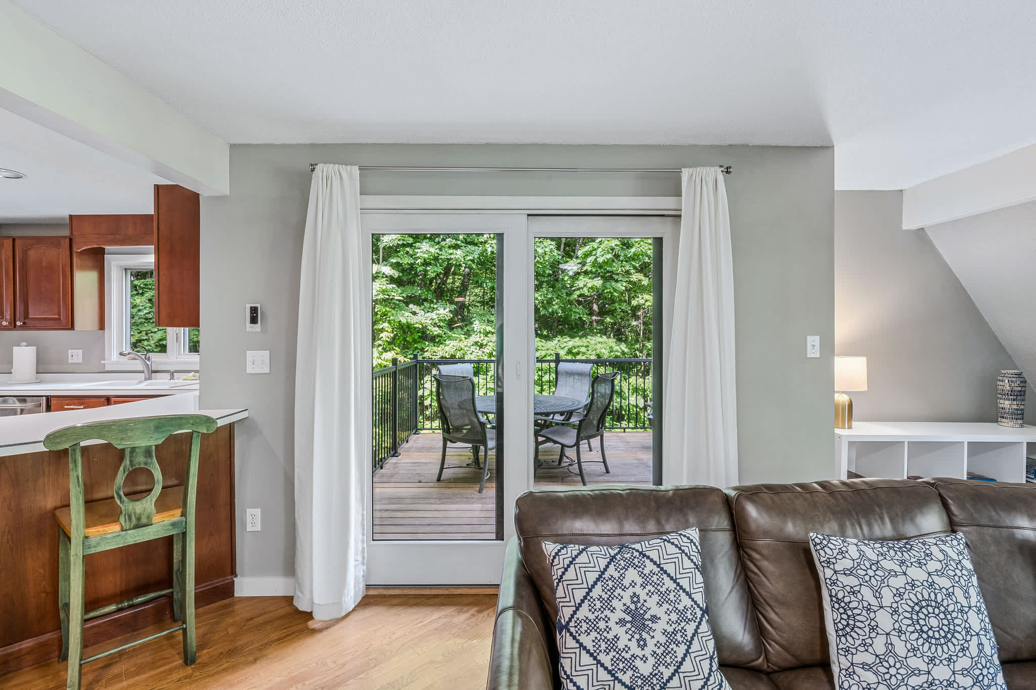 Living room with sliding doors to the private deck
