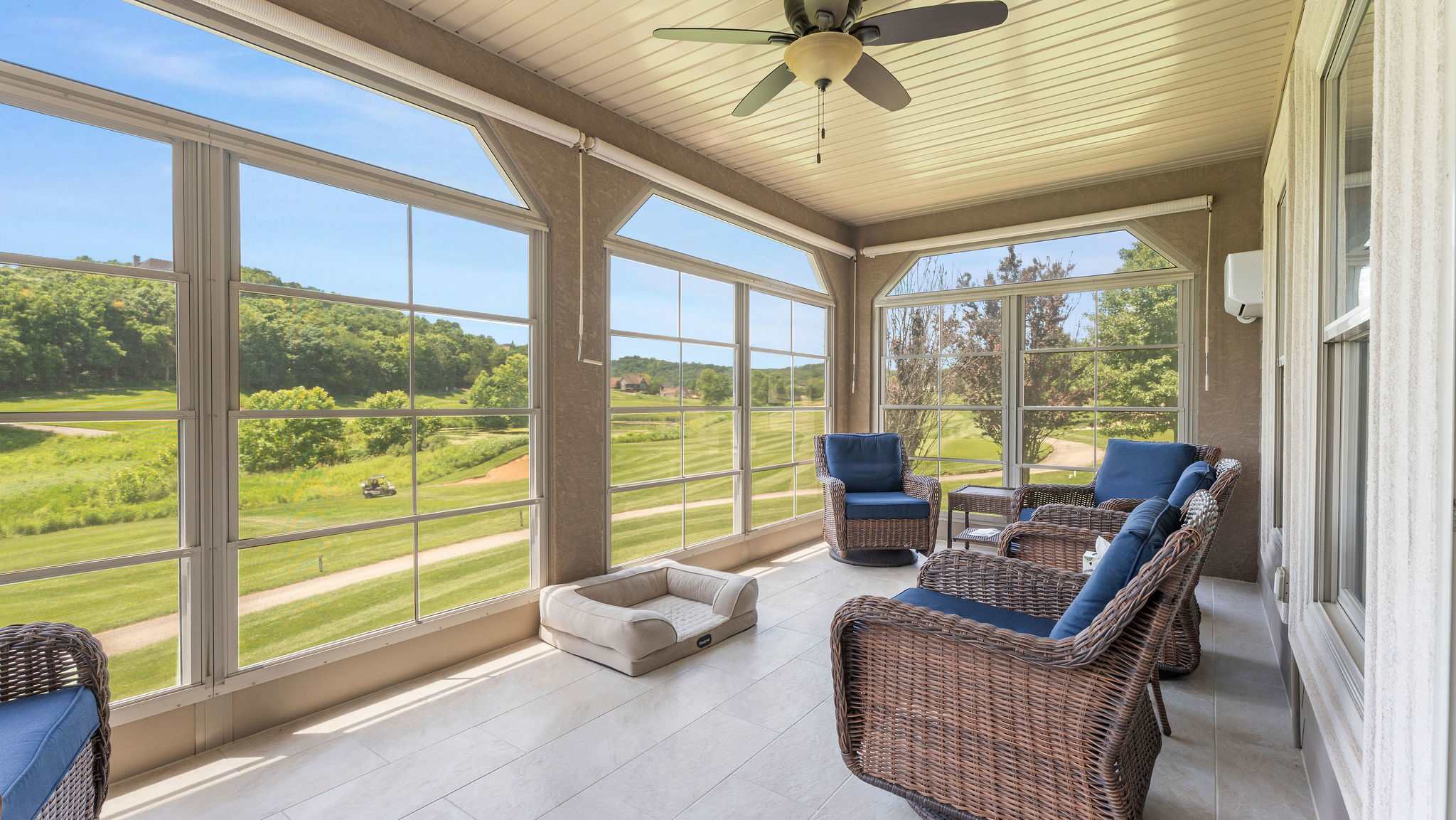 Sip morning coffee or an evening cocktail in Blue Villa’s serene sunroom​