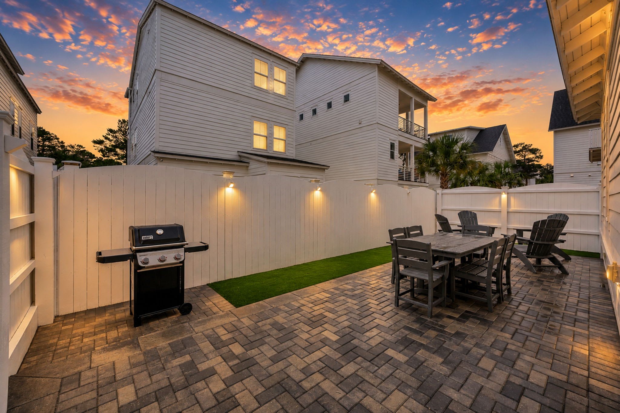 Private backyard oasis with seating & grill