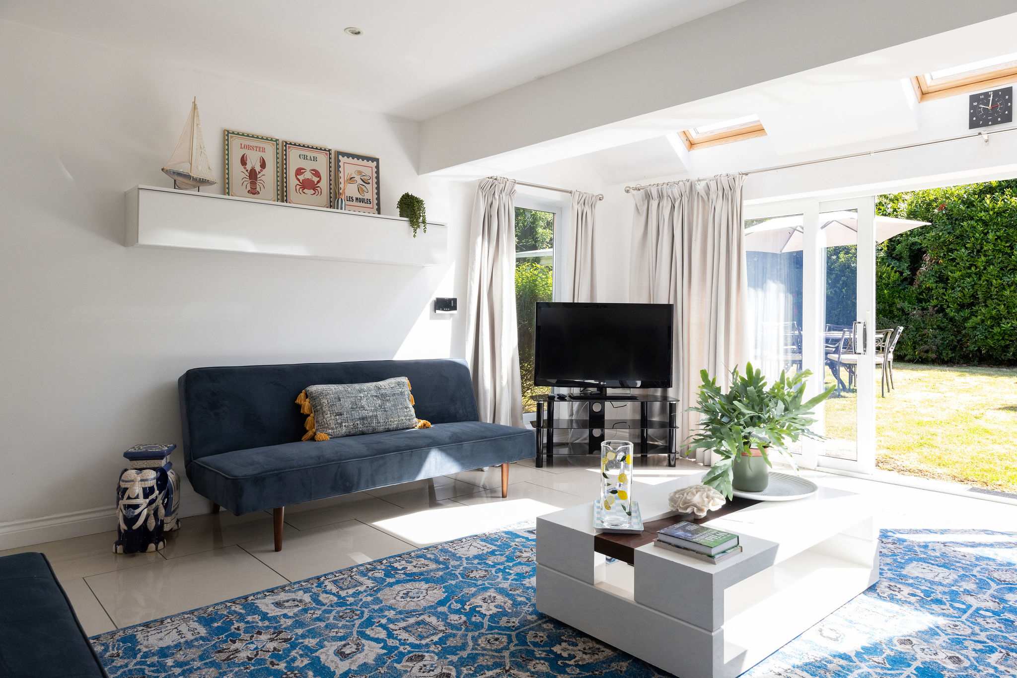 Relax in this modern living space with bright interiors for your perfect family getaway.