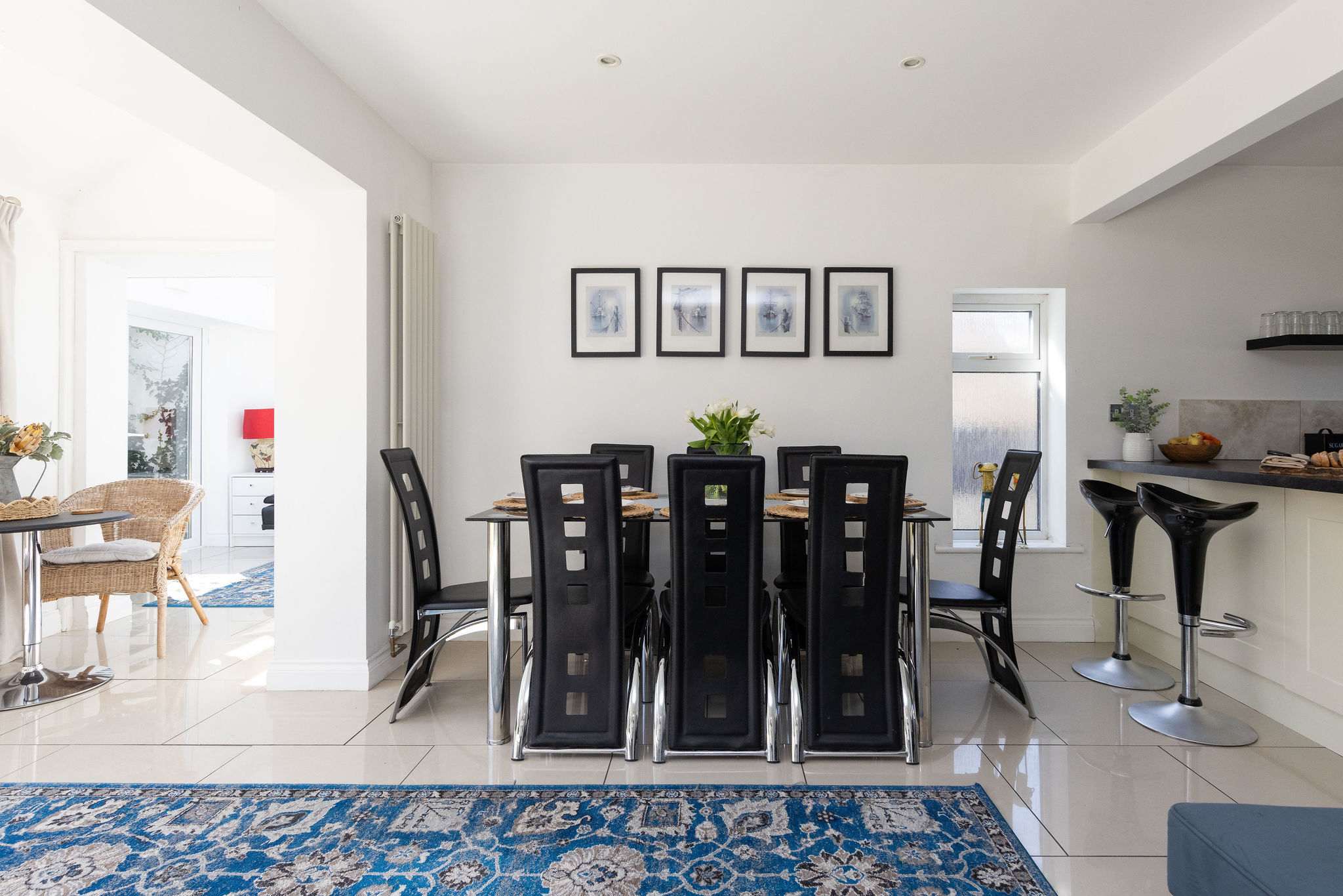 Enjoy meals together in the spacious dining area of this bright family getaway.