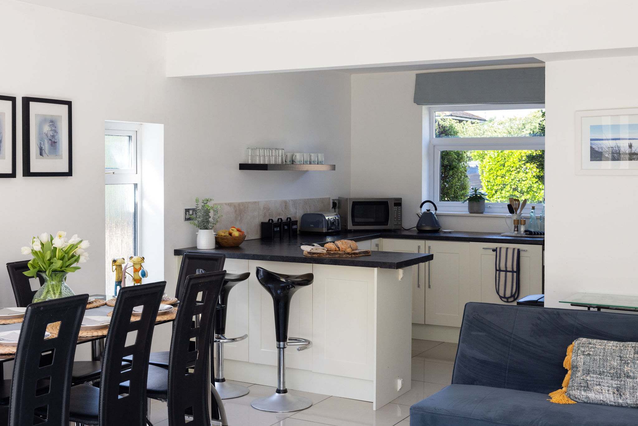 Prepare delicious meals in the modern, open plan kitchen of this relaxing holiday home.