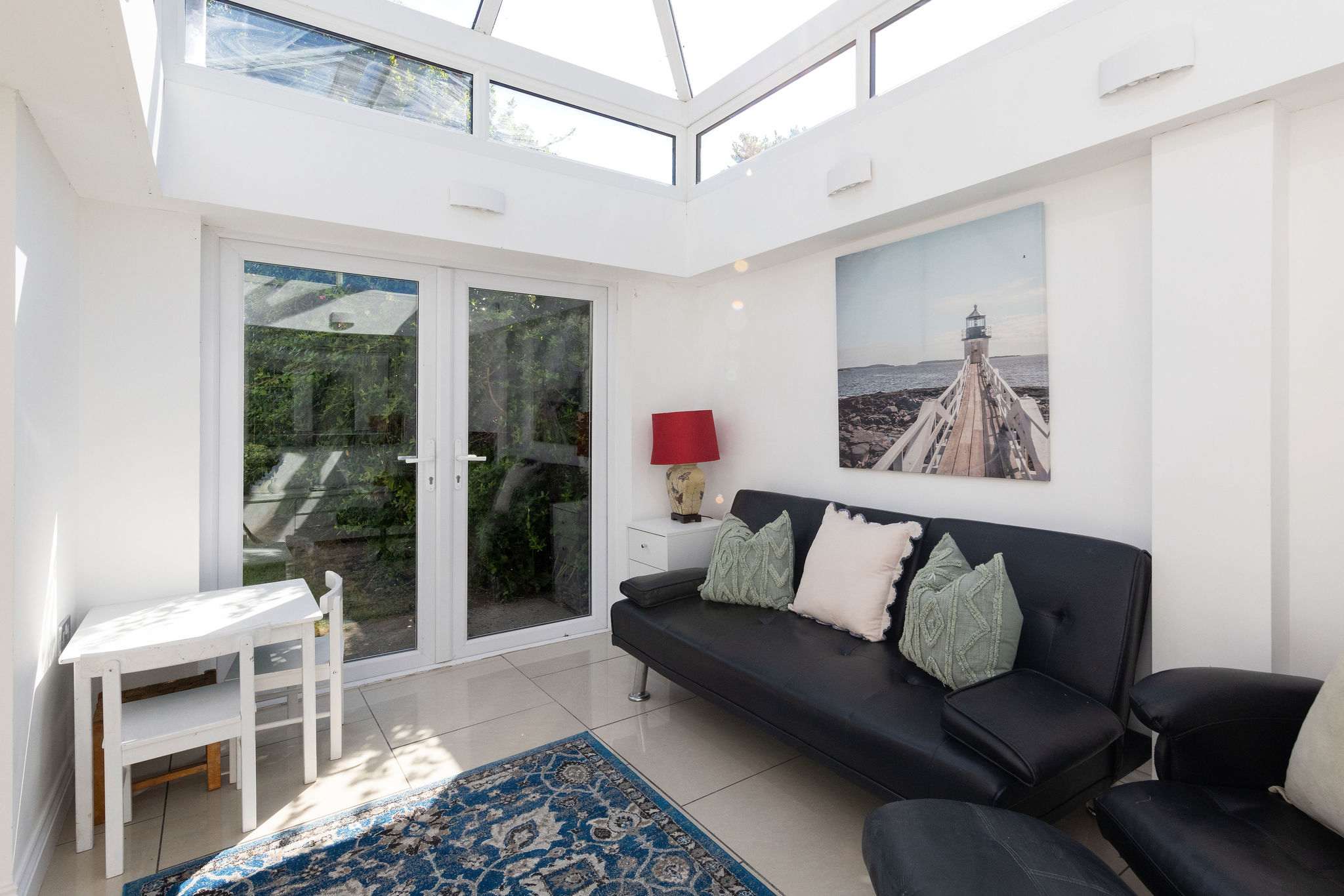 Relax in the bright, inviting conservatory of this peaceful coastal retreat with garden access.