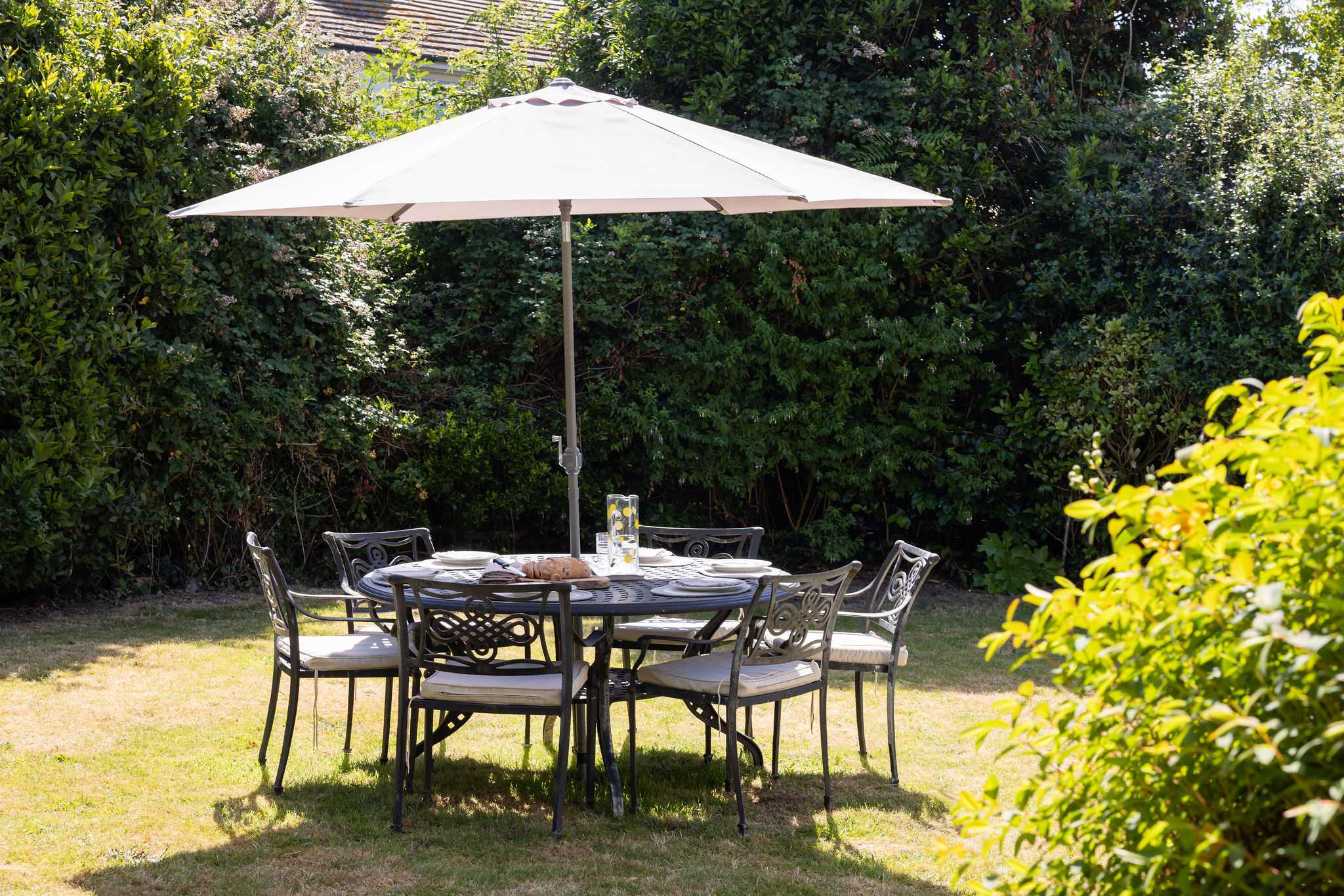 Share delightful outdoor meals in the private, sunny garden of our coastal holiday home.