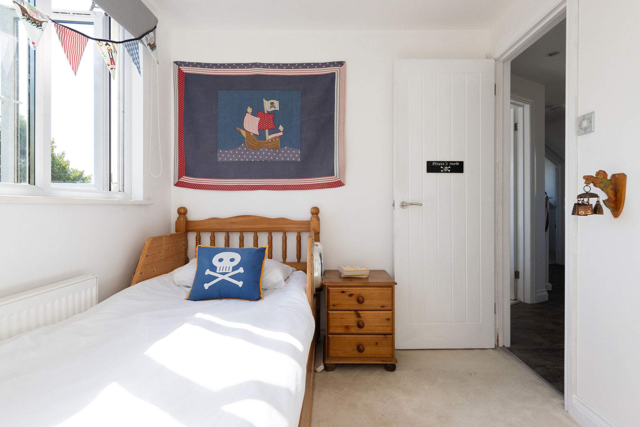 Children will adore this fun pirate-themed bedroom during your memorable family getaway.