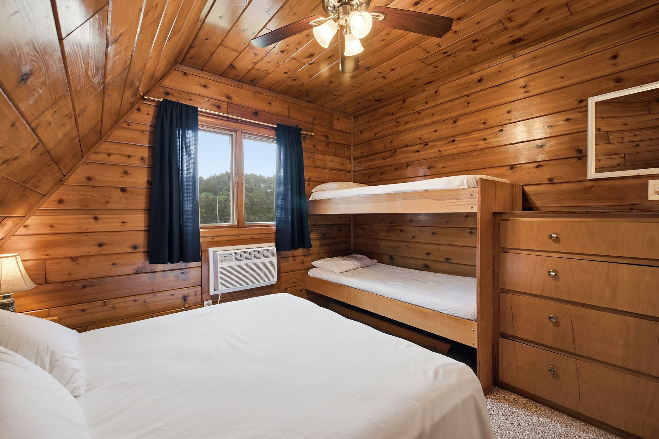 Bedroom 2 is on the 2nd floor and has a queen and single bunk bed.