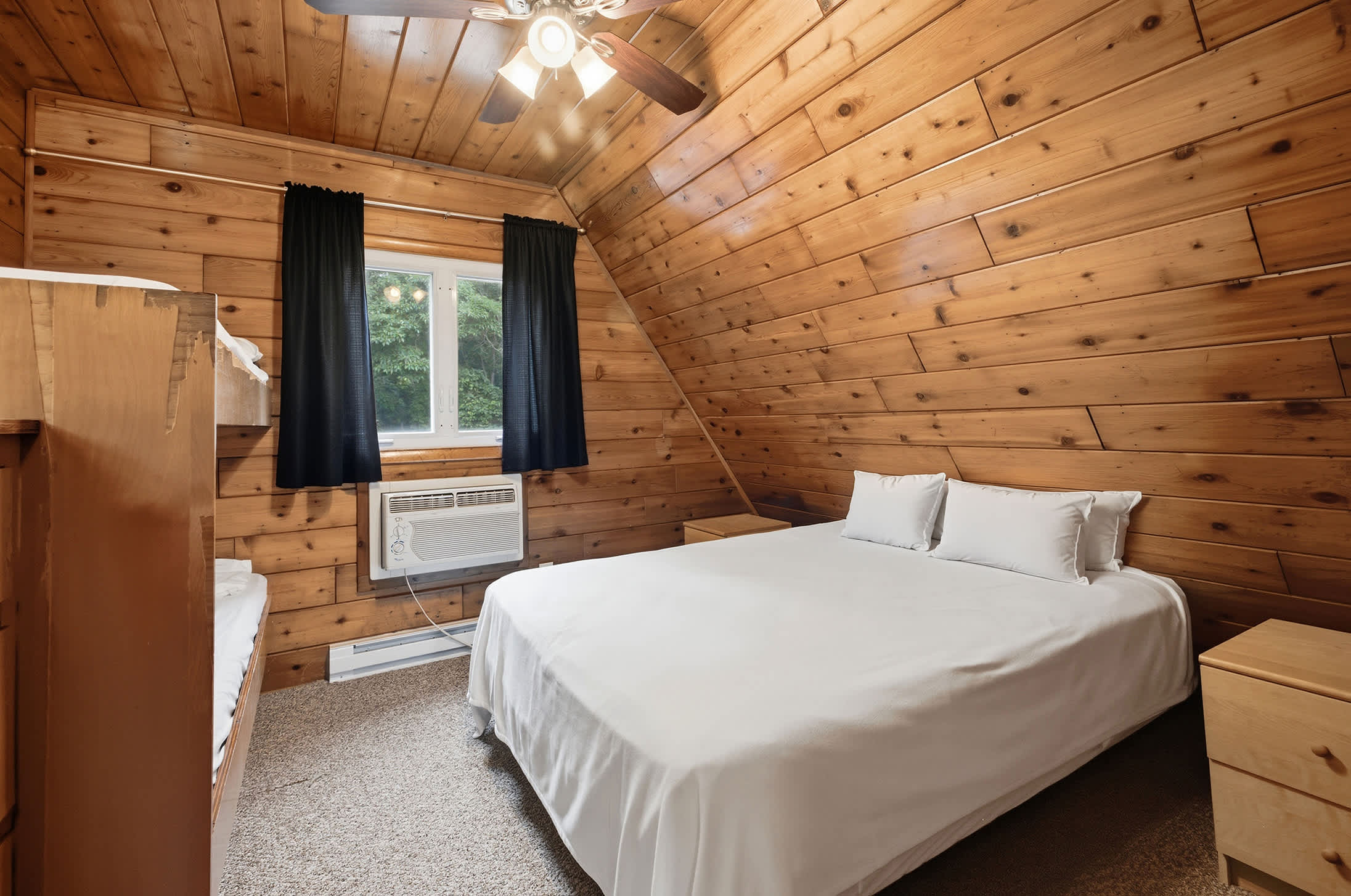 Bedroom 1 is on the 2nd floor and has a queen and single bunk bed.