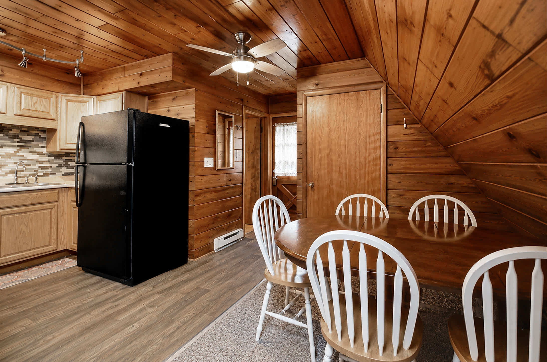 Open dining space connects the kitchen for easy shared meals.