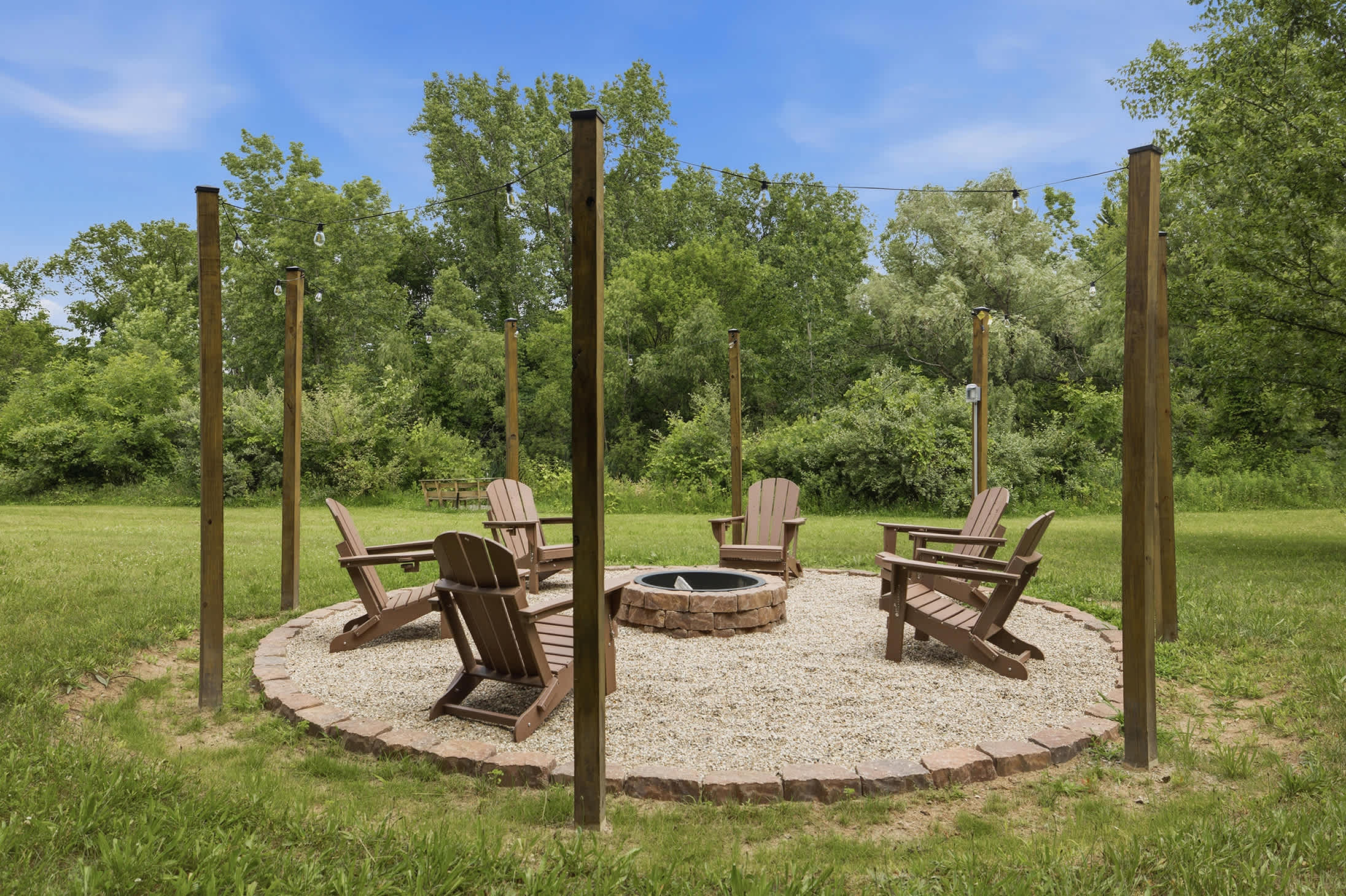 Gather around your private fire pit with comfy Adirondacks.