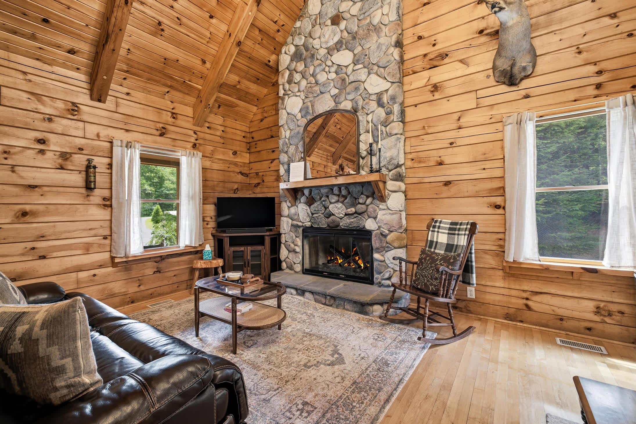 Welcome to warm wood interiors and inviting fireside seating.