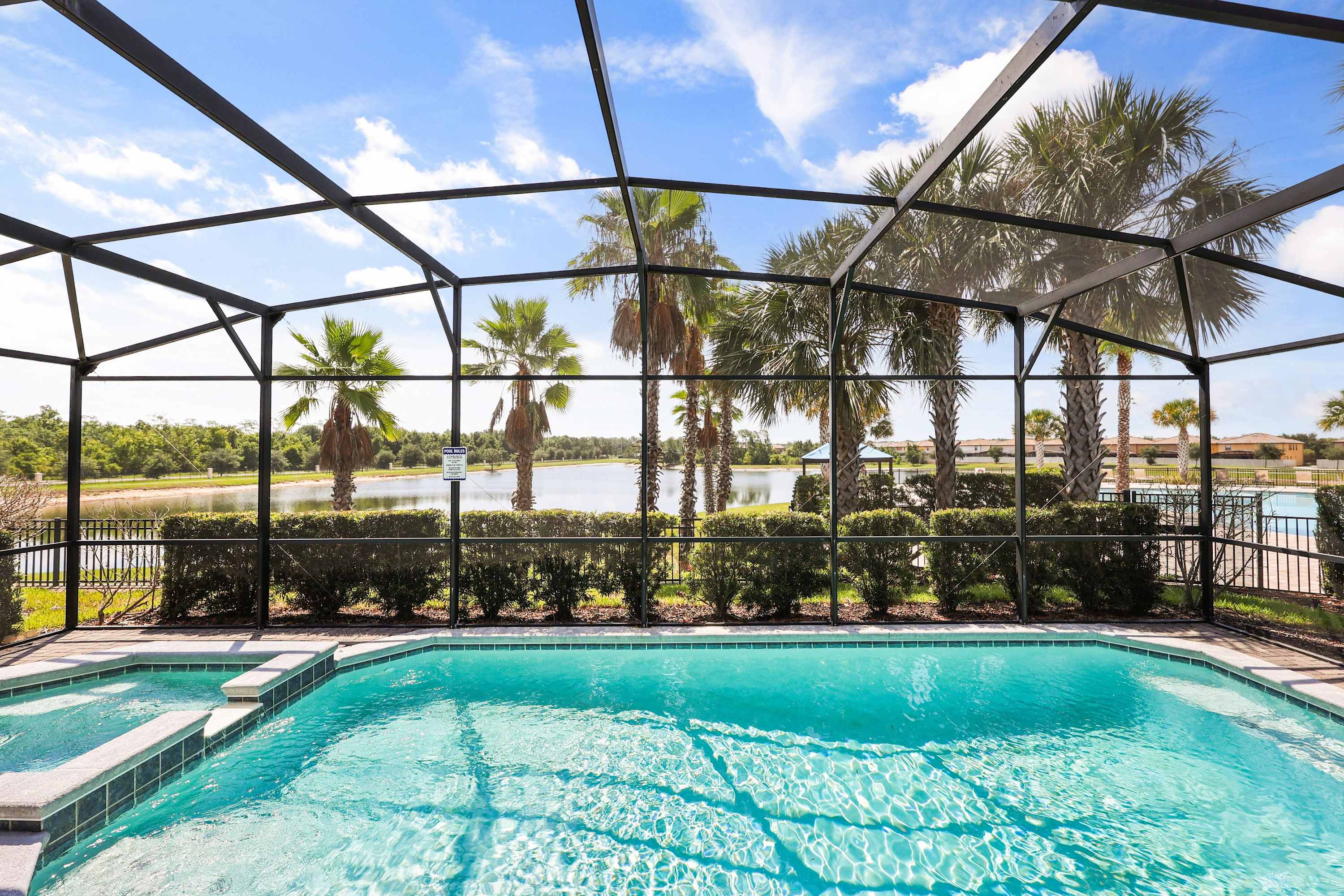 The lake view accompanies your morning swims and lazy afternoons, lounging in your own private backyard paradise