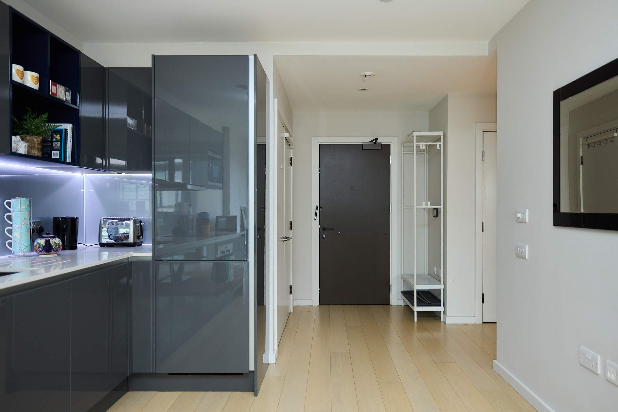 Minimalist Grey Design & Sunlit Glass in Flat 201, Cassia Point, Glasshouse Gardens, E20 1HR London, United Kingdom E20 1HR - Property image 4 - VivreStays
