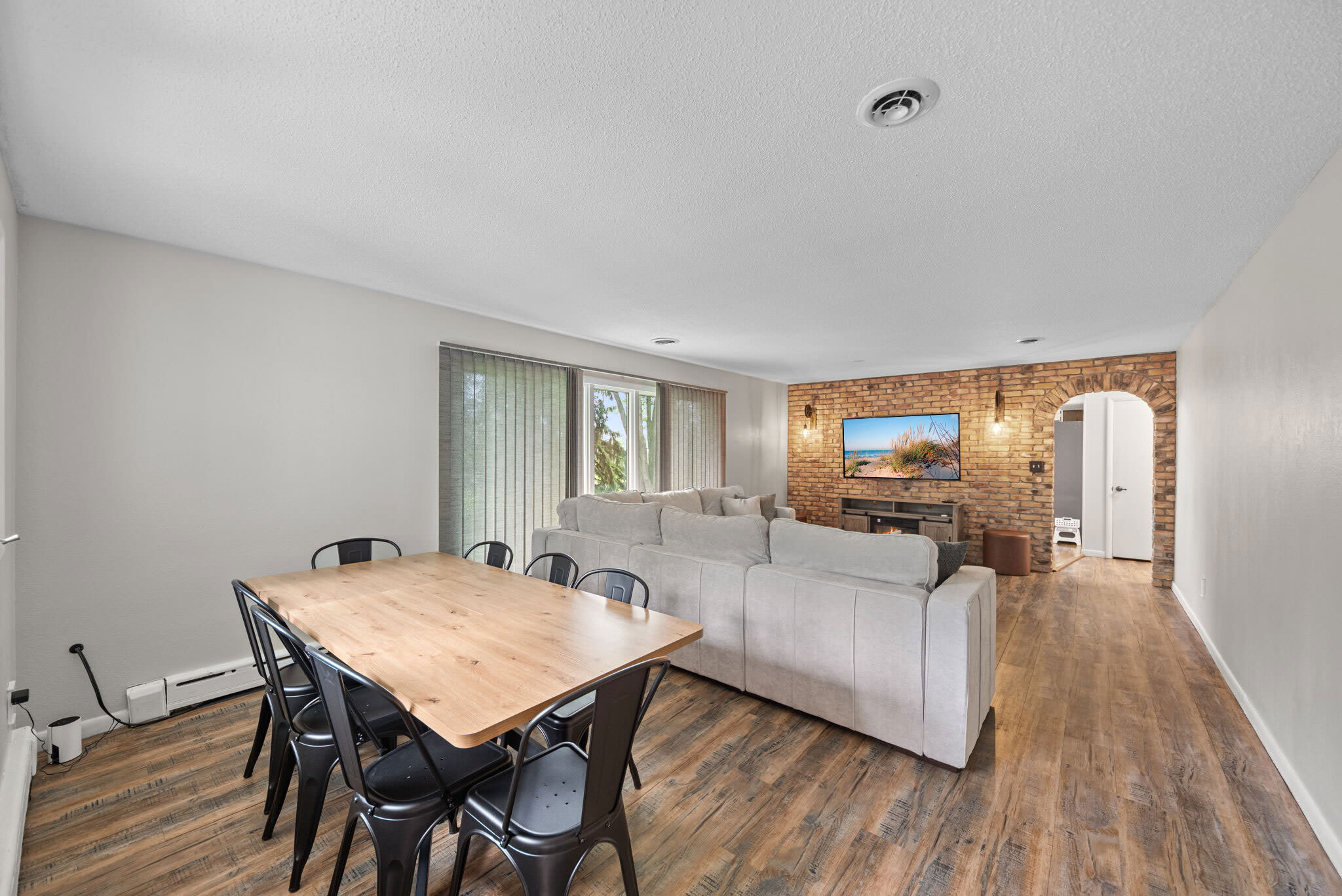 Open dining and living spaces keep your group together with ease.