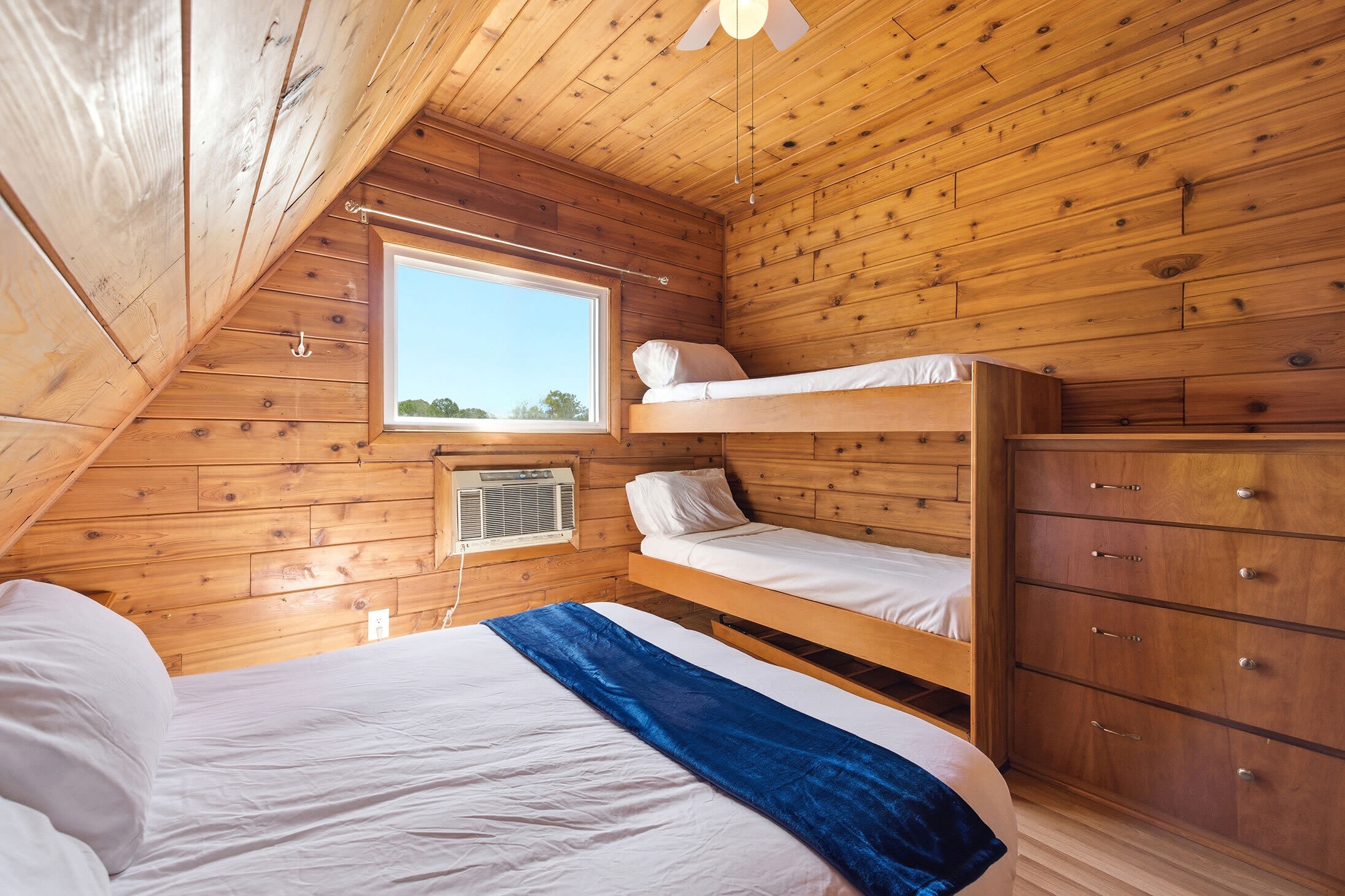 Bedroom 2 is on the 2nd floor and has a queen and single bunk bed.