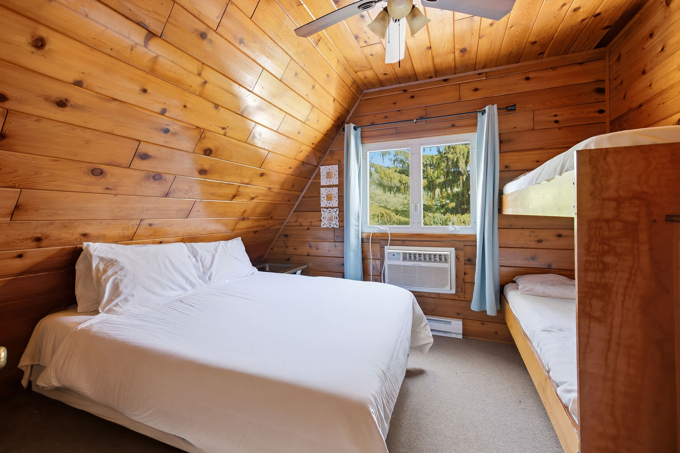 Bedroom 2 is on the 2nd floor and has a queen and single bunk bed.