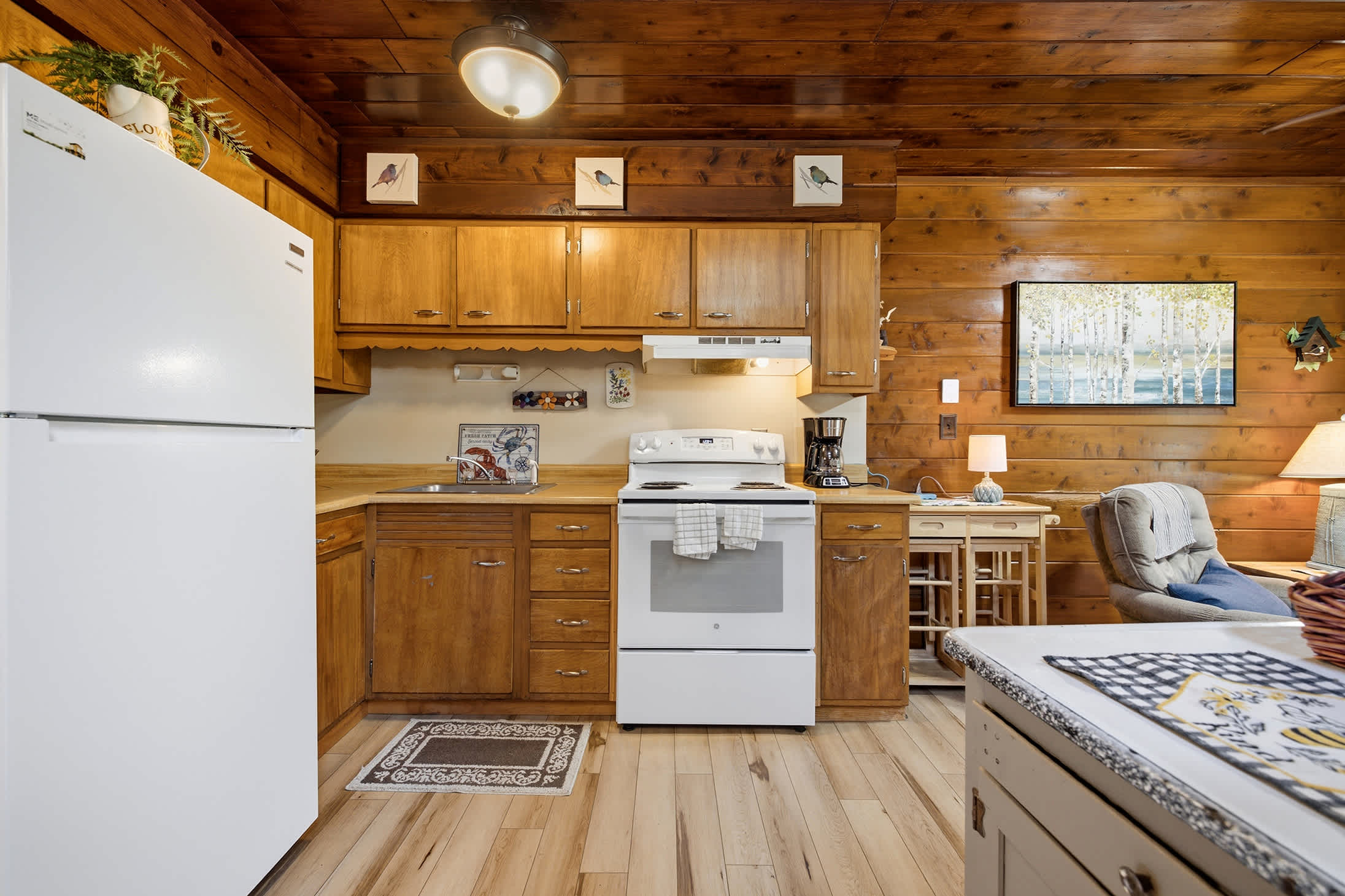 The open kitchen keeps the cook connected to every conversation and family moment.