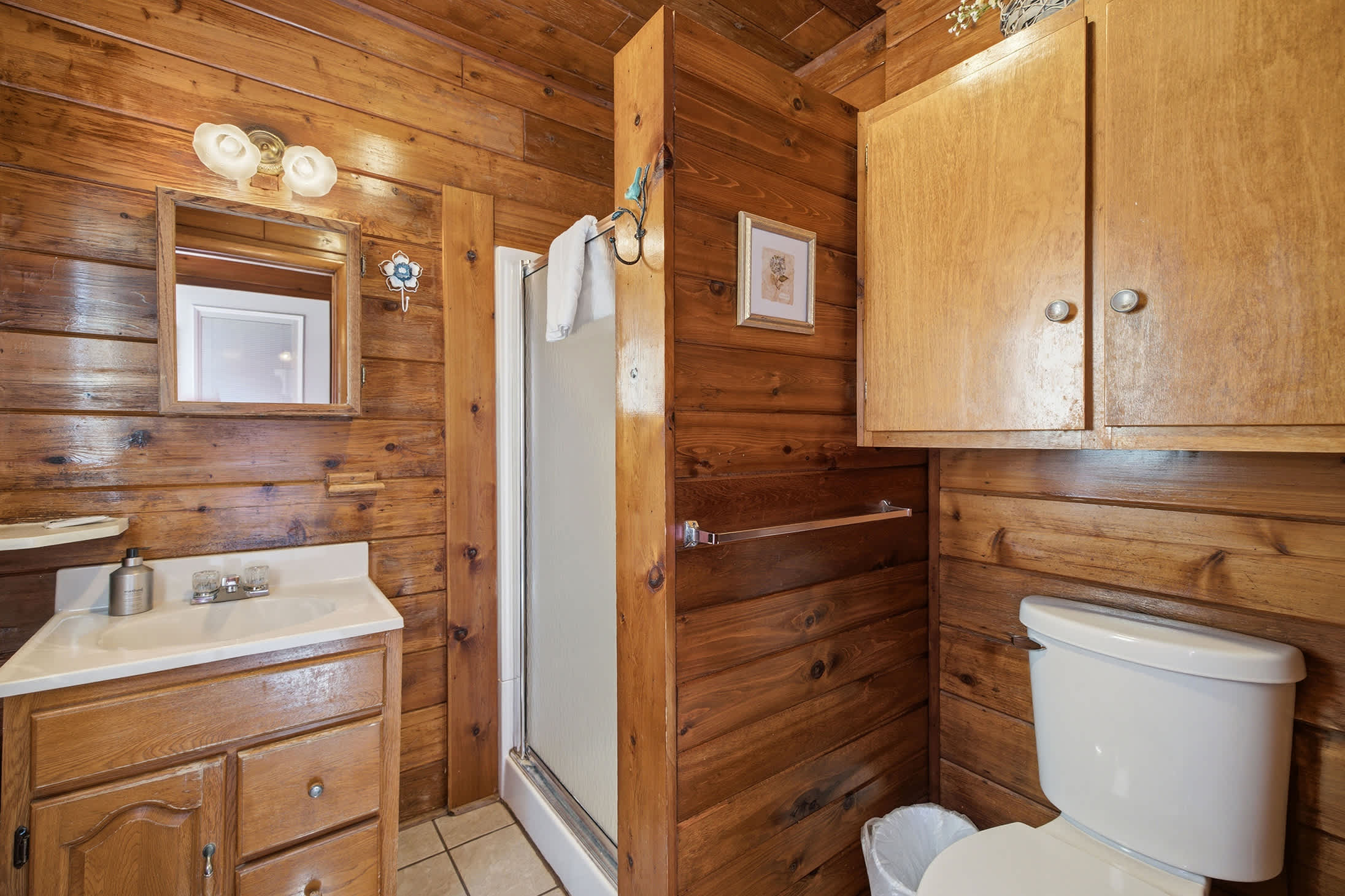 A walk in shower and convenient vanity make it easy to refresh after the beach.