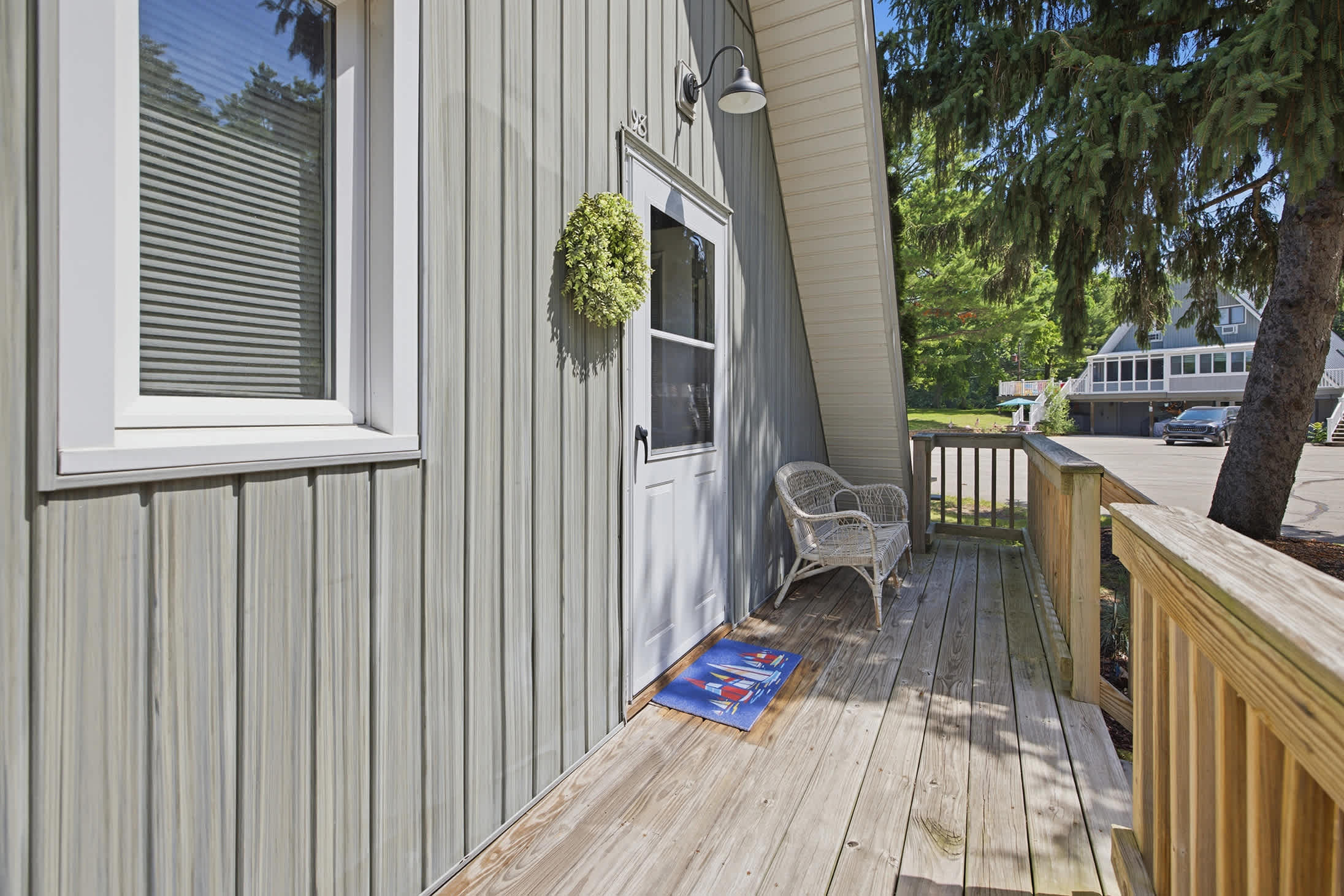 The front porch welcomes you home after days spent swimming, hiking, and exploring.