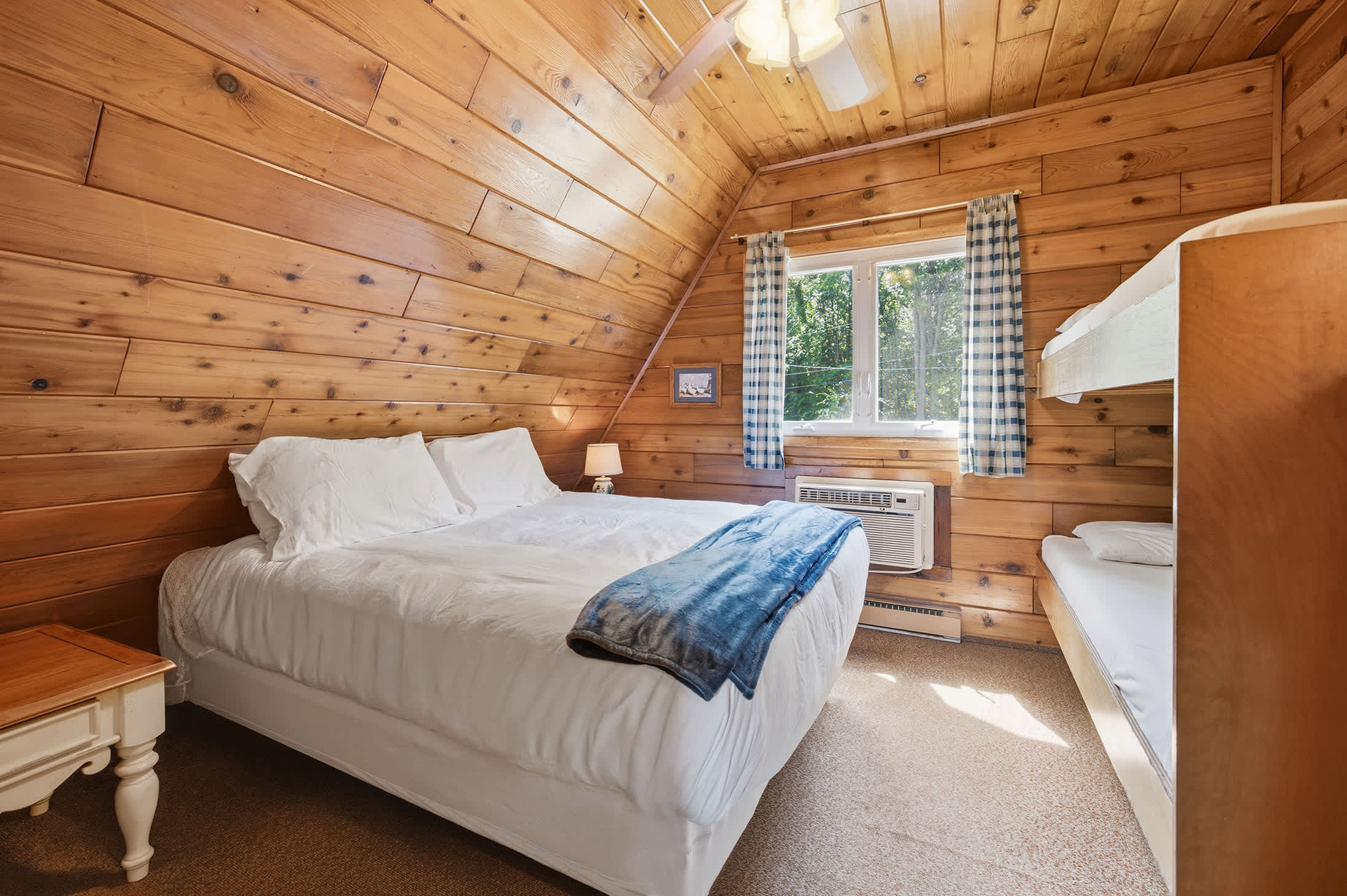 Bedroom 1 is on the 2nd floor and has a queen and single bunk bed.