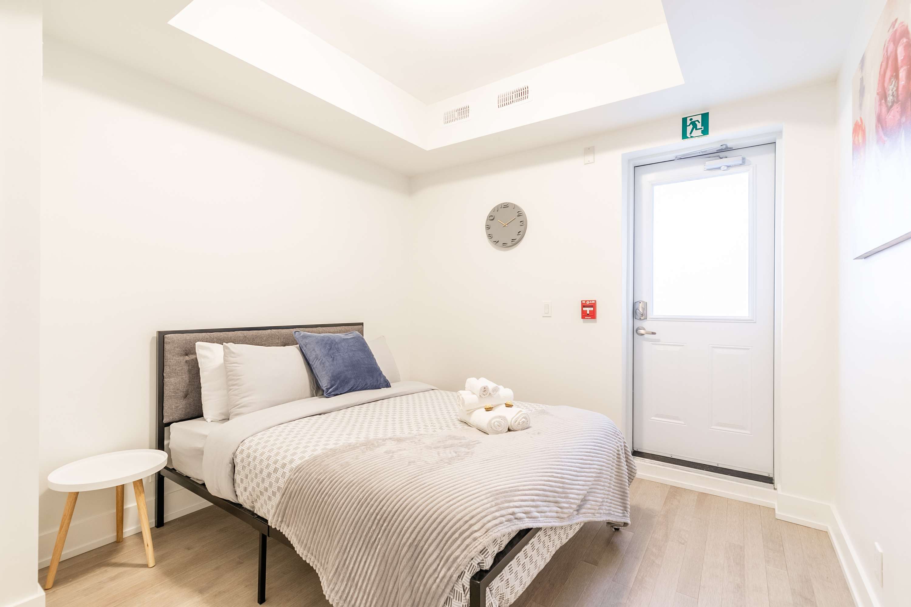 Second bedroom with a plush double bed dressed in clean linens