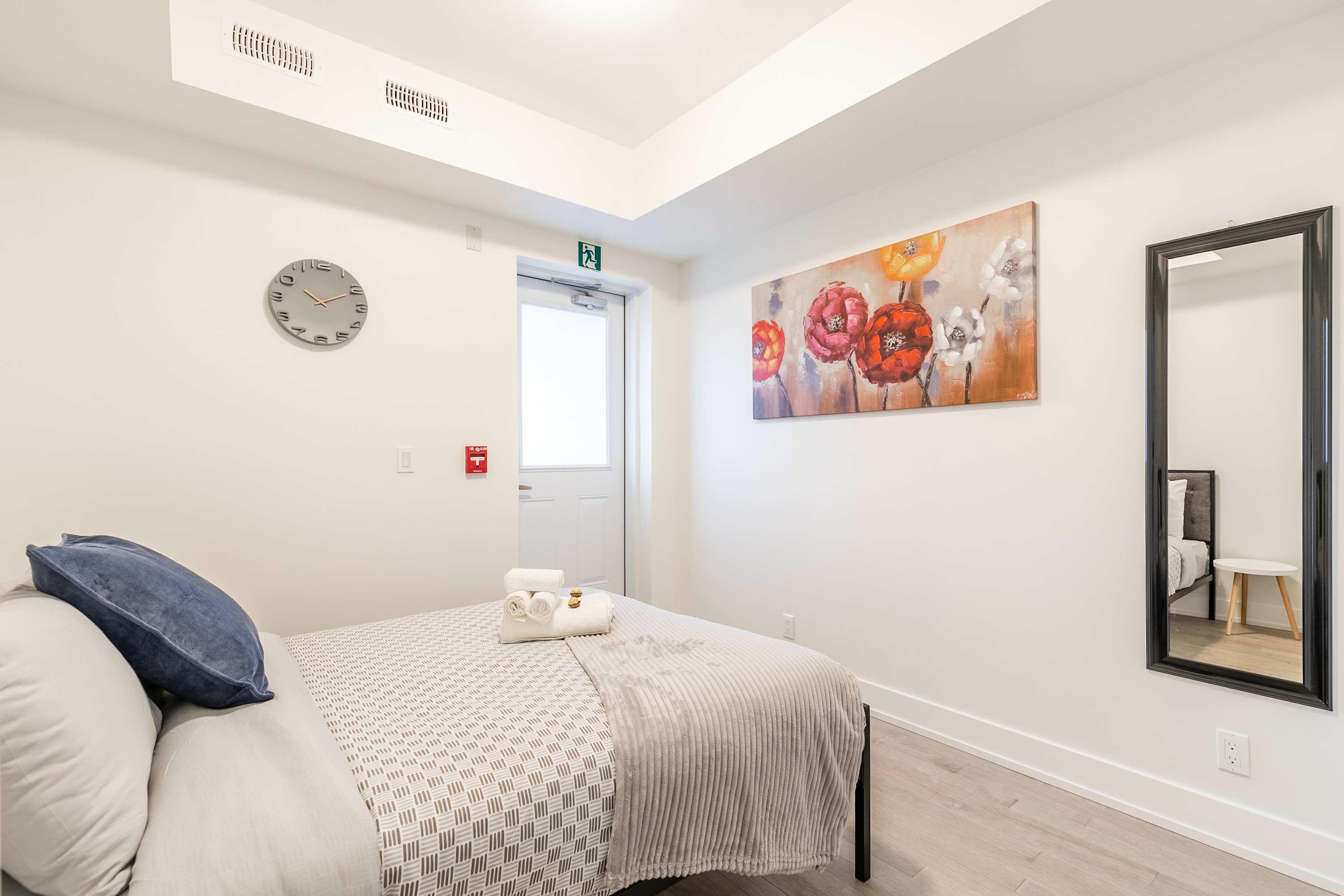 Second bedroom with a double bed and fresh linens