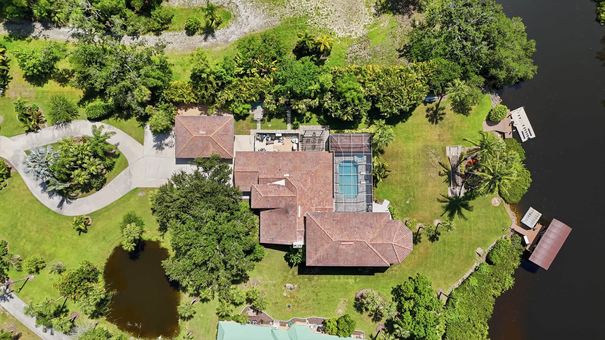 Riverfront Retreat with Pool Spa Dock | Photo 70