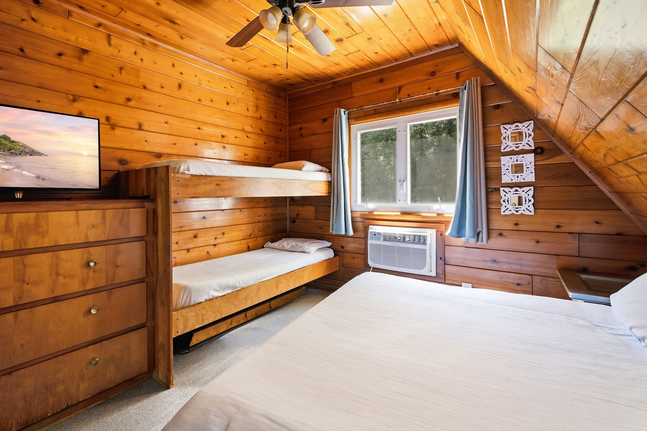 Bedroom 1 is on the 2nd floor and has a queen and single bunk bed.
