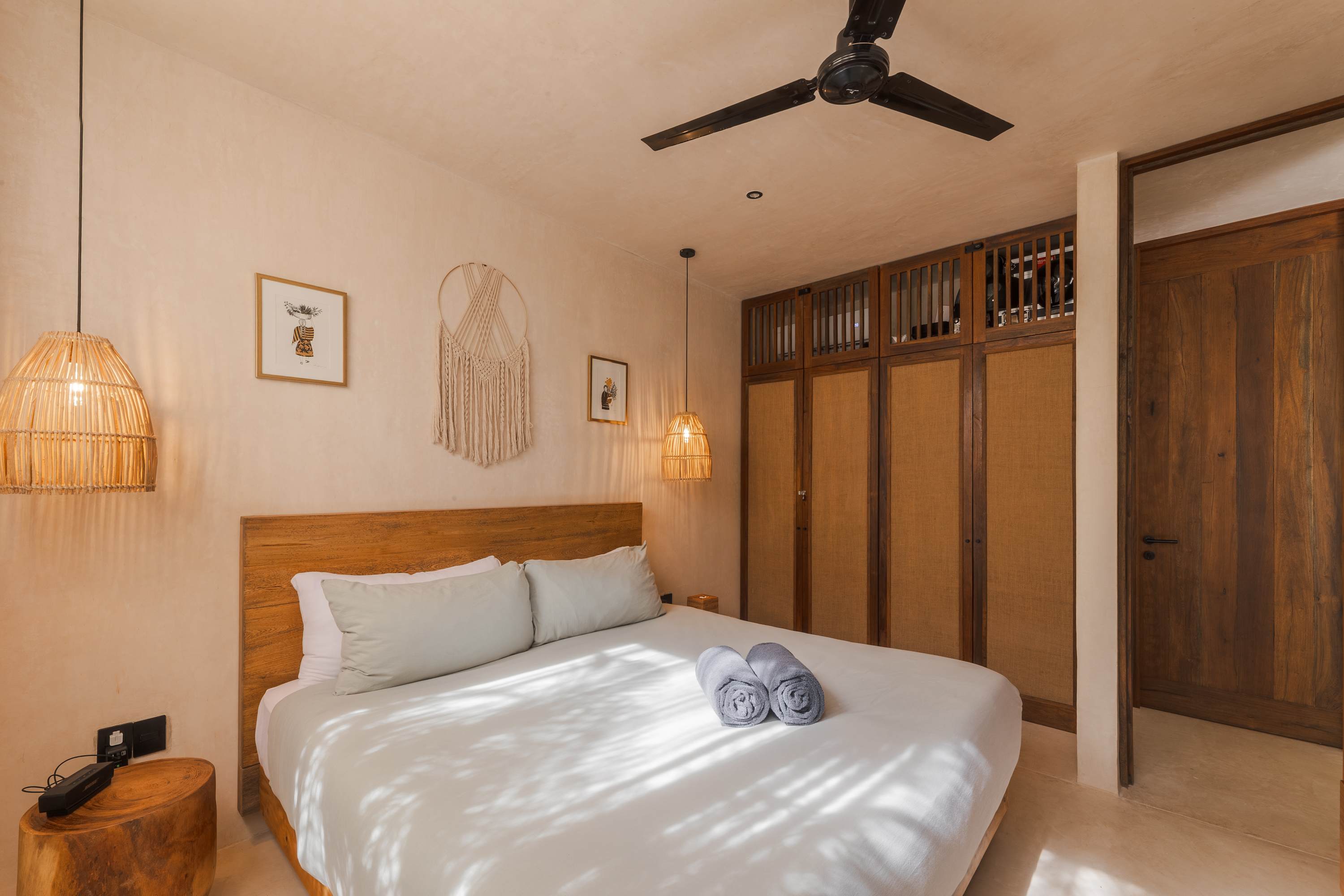 Spacious and inviting bedroom filled with natural light, creating a bright, cozy, and romantic atmosphere.
