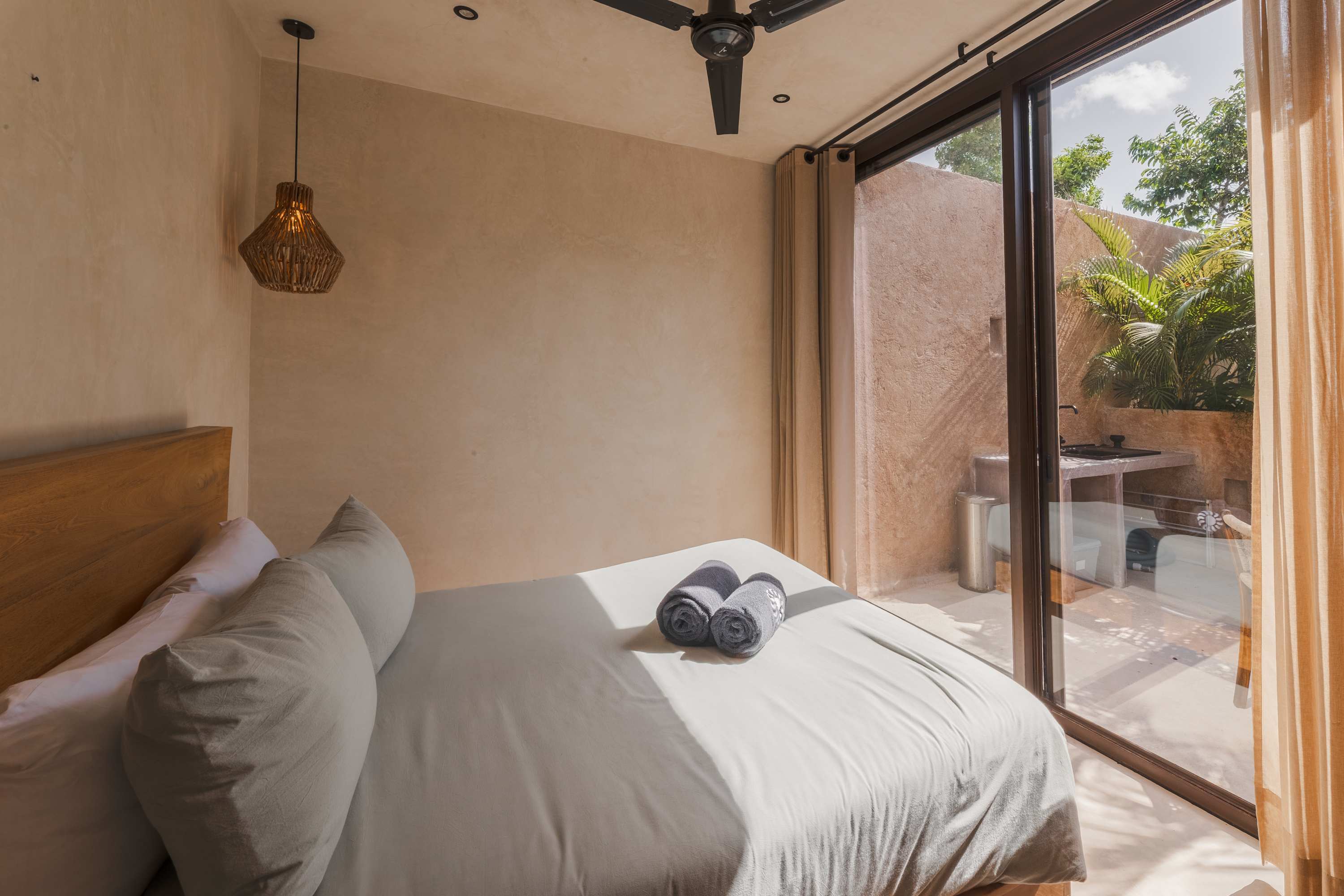 Lovely bedroom, spacious and beautifully illuminated with natural light, creating a warm and romantic atmosphere