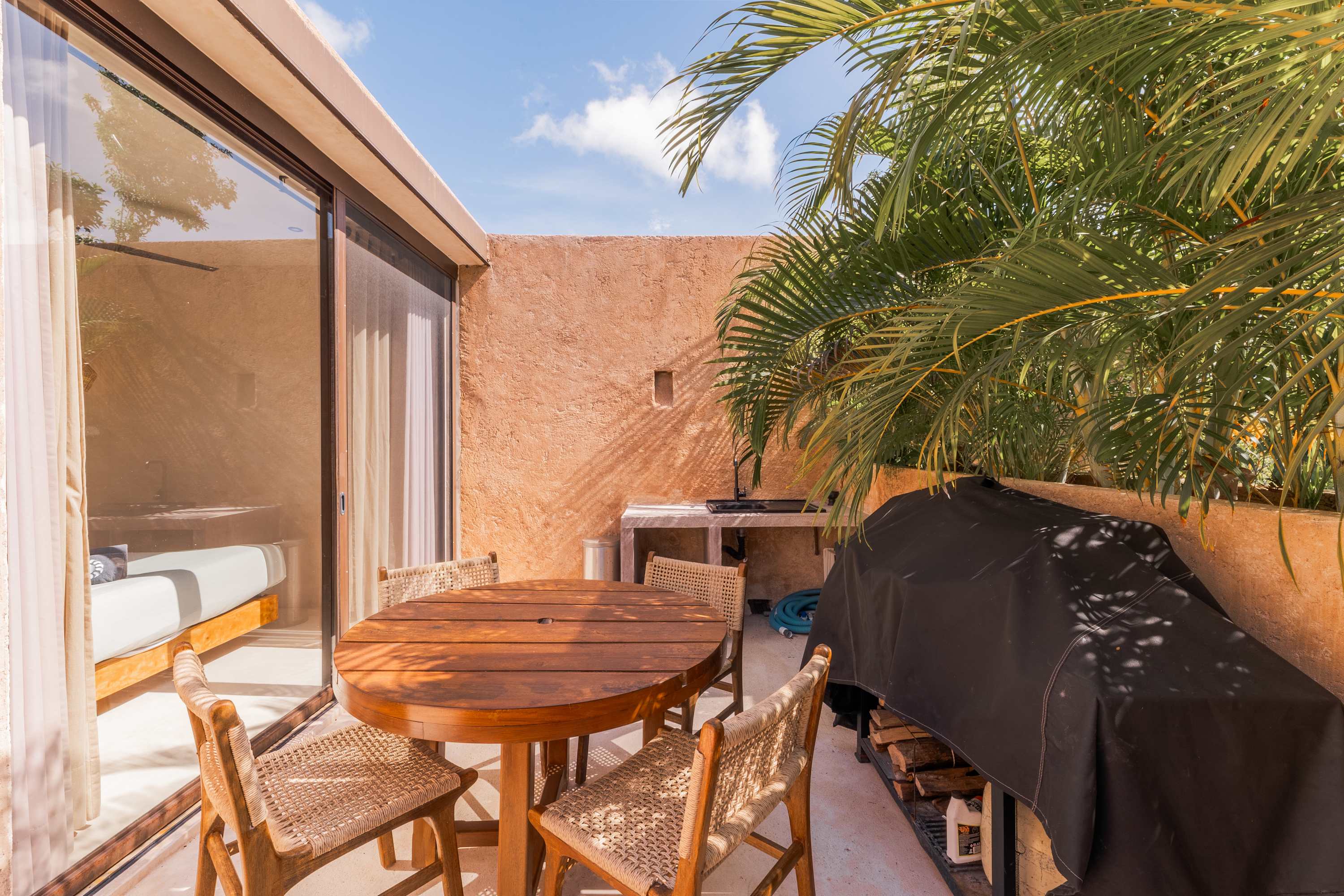 Enjoy the Tulum breeze from your private rooftop, ideal for lounging, grilling, and outdoor meals. + Plunge pool