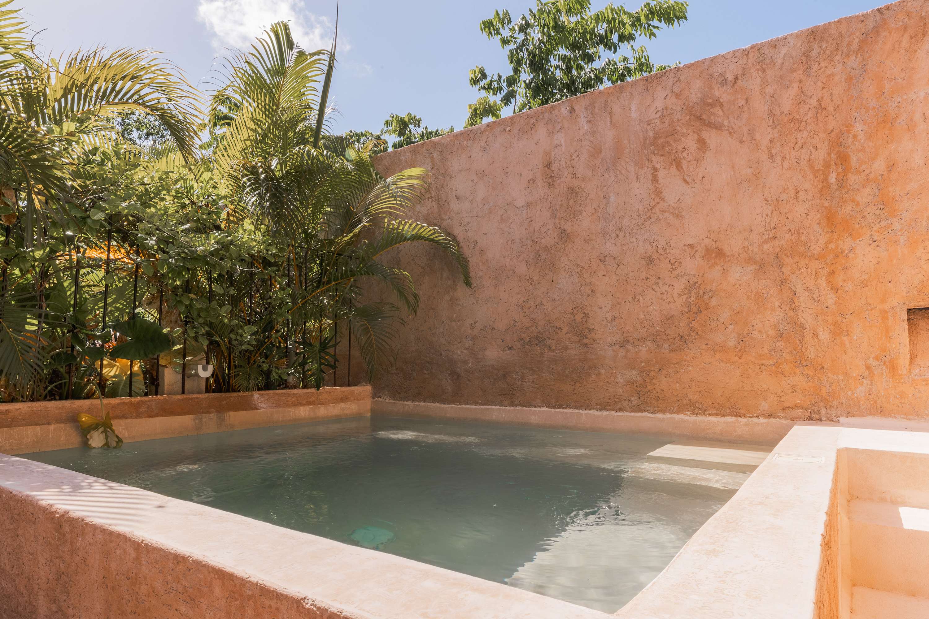 Enjoy the Tulum breeze from your private rooftop, ideal for lounging, grilling, and outdoor meals. + Plunge pool