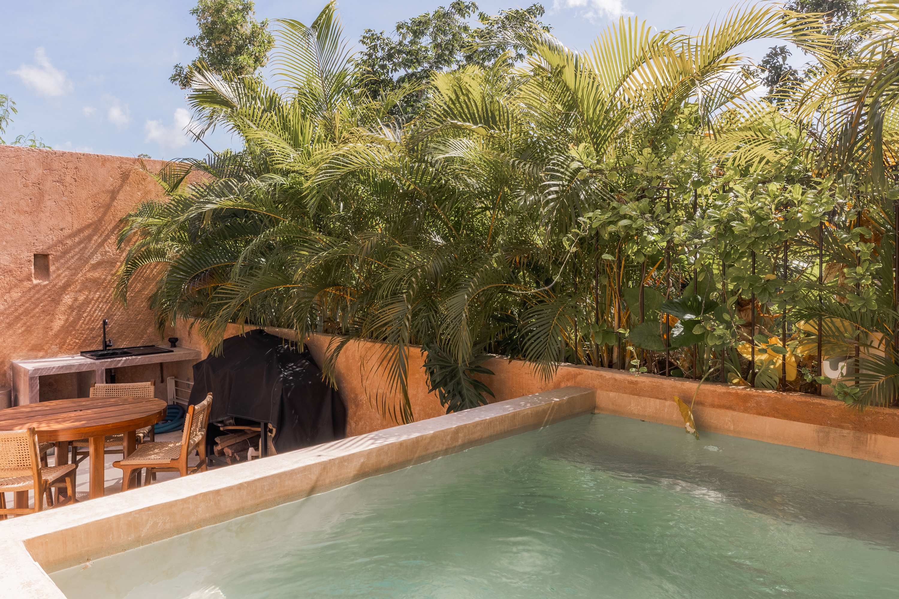 Enjoy the Tulum breeze from your private rooftop, ideal for lounging, grilling, and outdoor meals. + Plunge pool