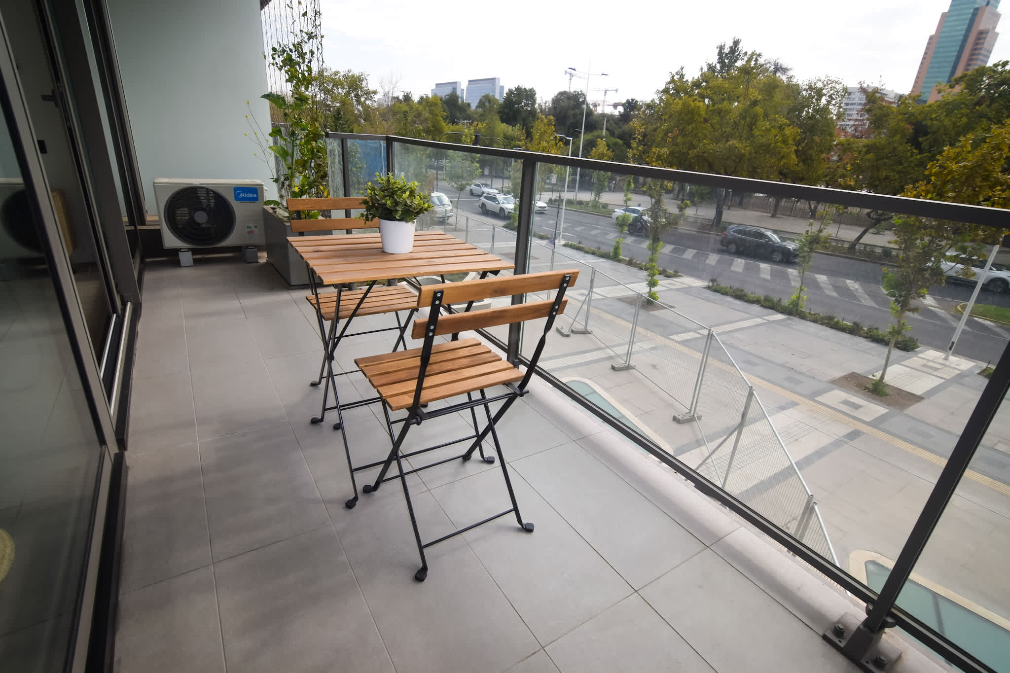 Relax on your private balcony with a view of the cityscape, perfect for morning coffee or evening relaxation.