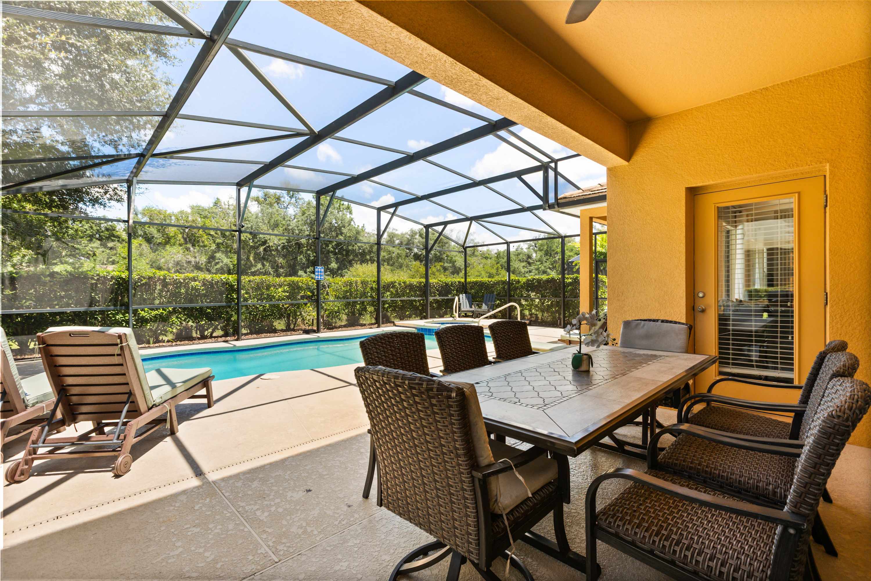 Lounge Poolside, Soak in the Hot Tub, and Dine Outdoors