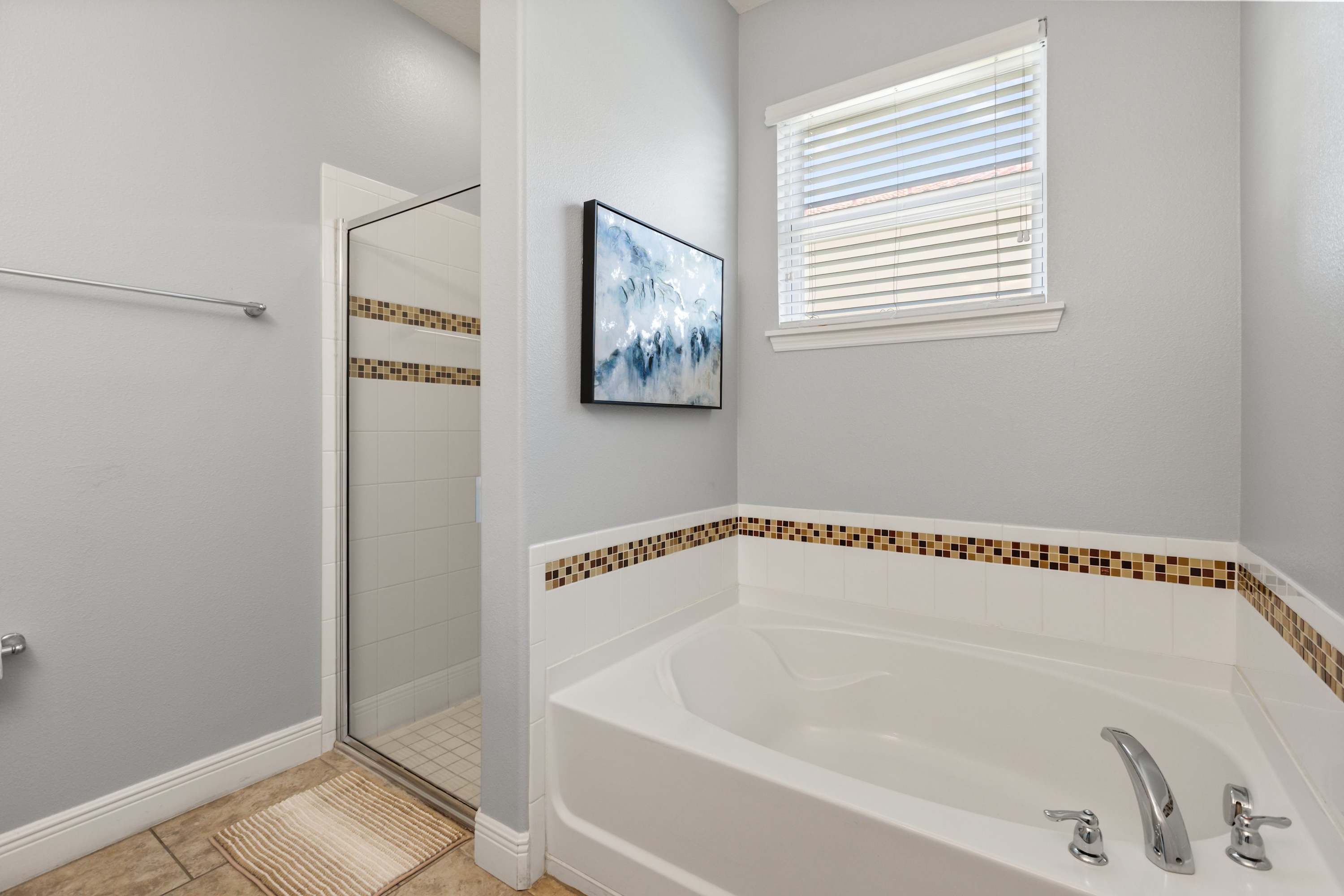 Unwind with a Bathtub and Separate Walk In Shower