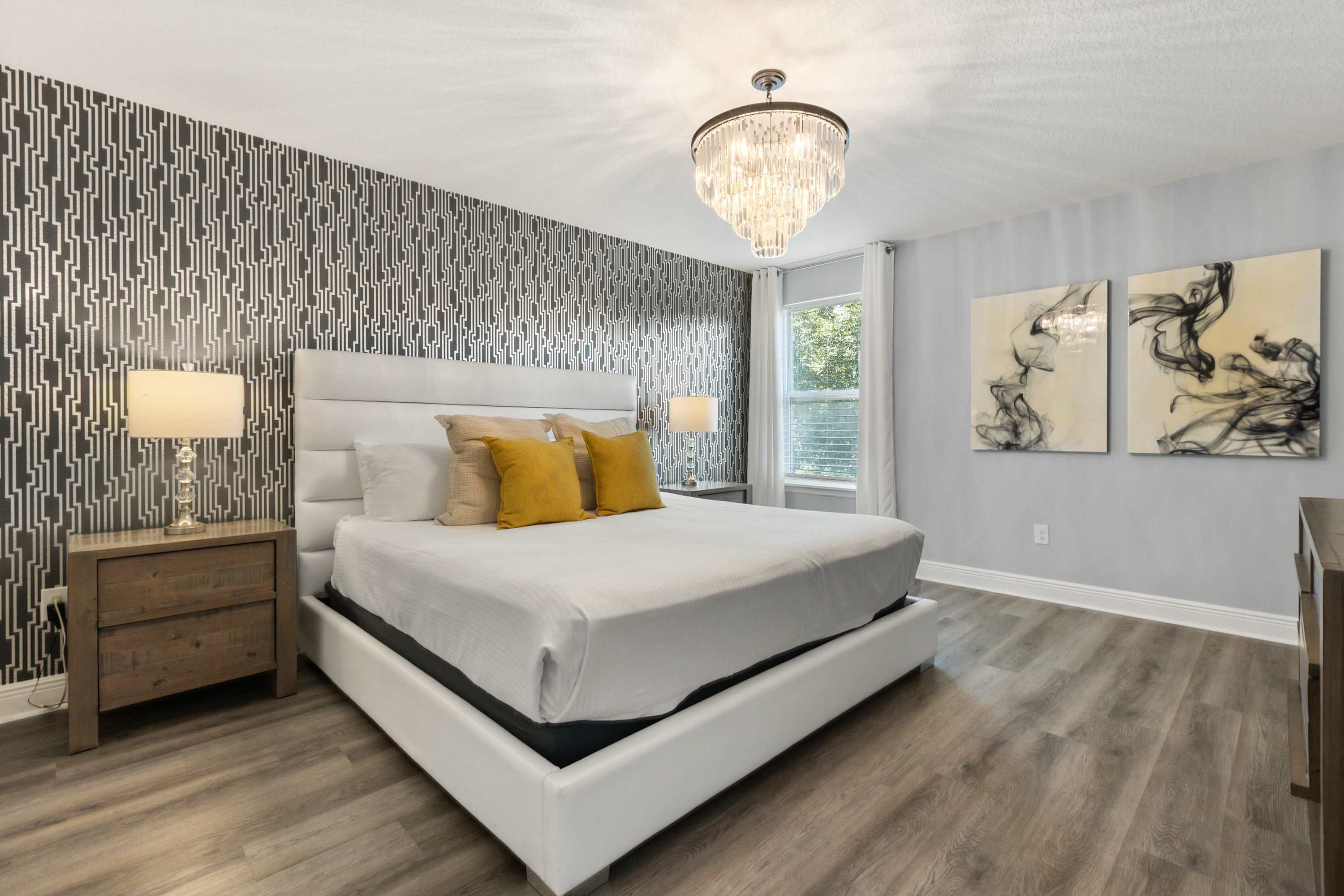 Sleep Beneath an Elegant Chandelier in King Bed Comfort