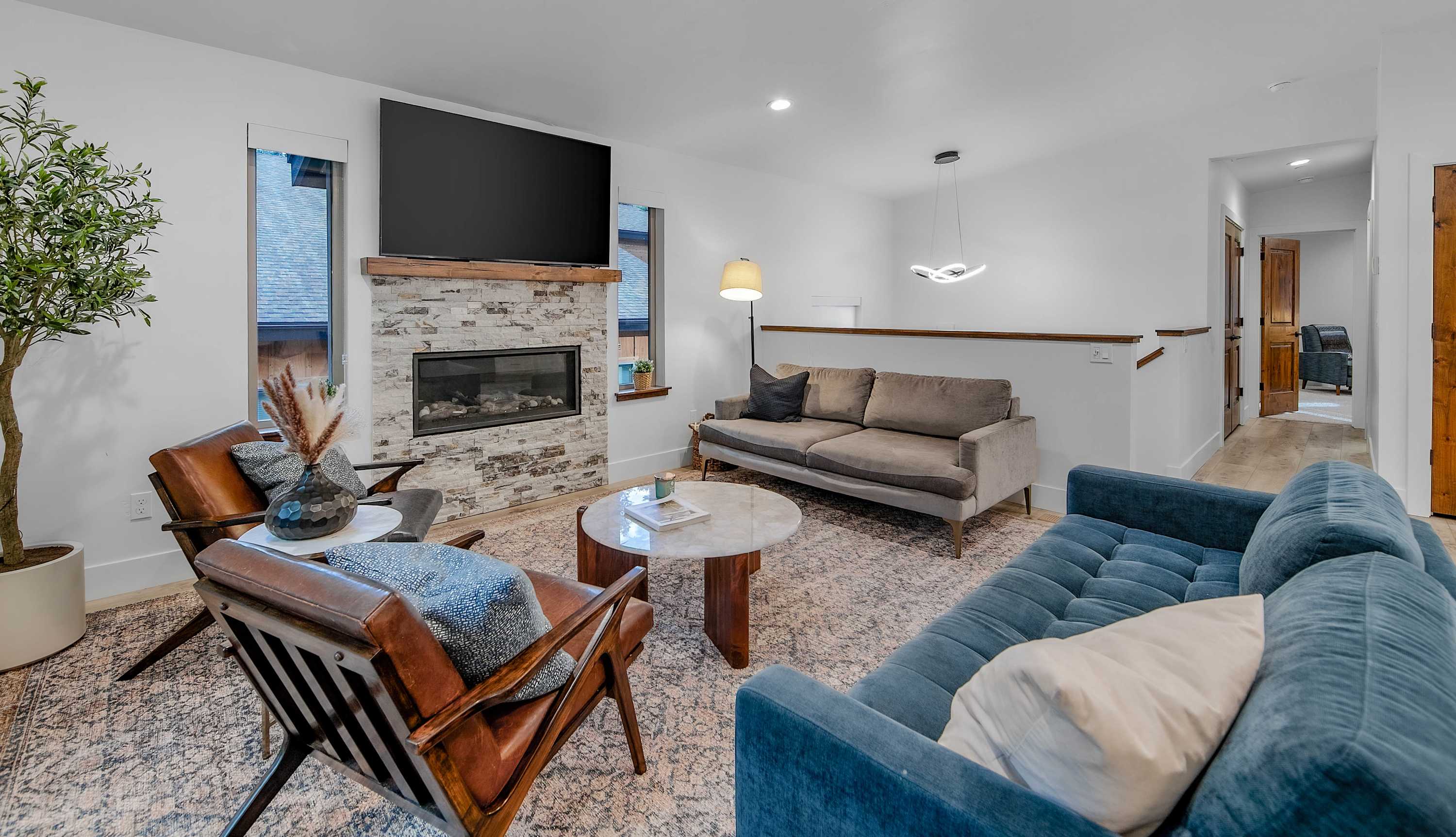 Kick back and unwind in this light-filled living space.
